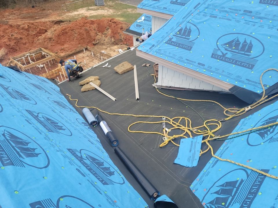 Residential Roofing Installation using Roof Replacement by American Roofing & Construction LLC