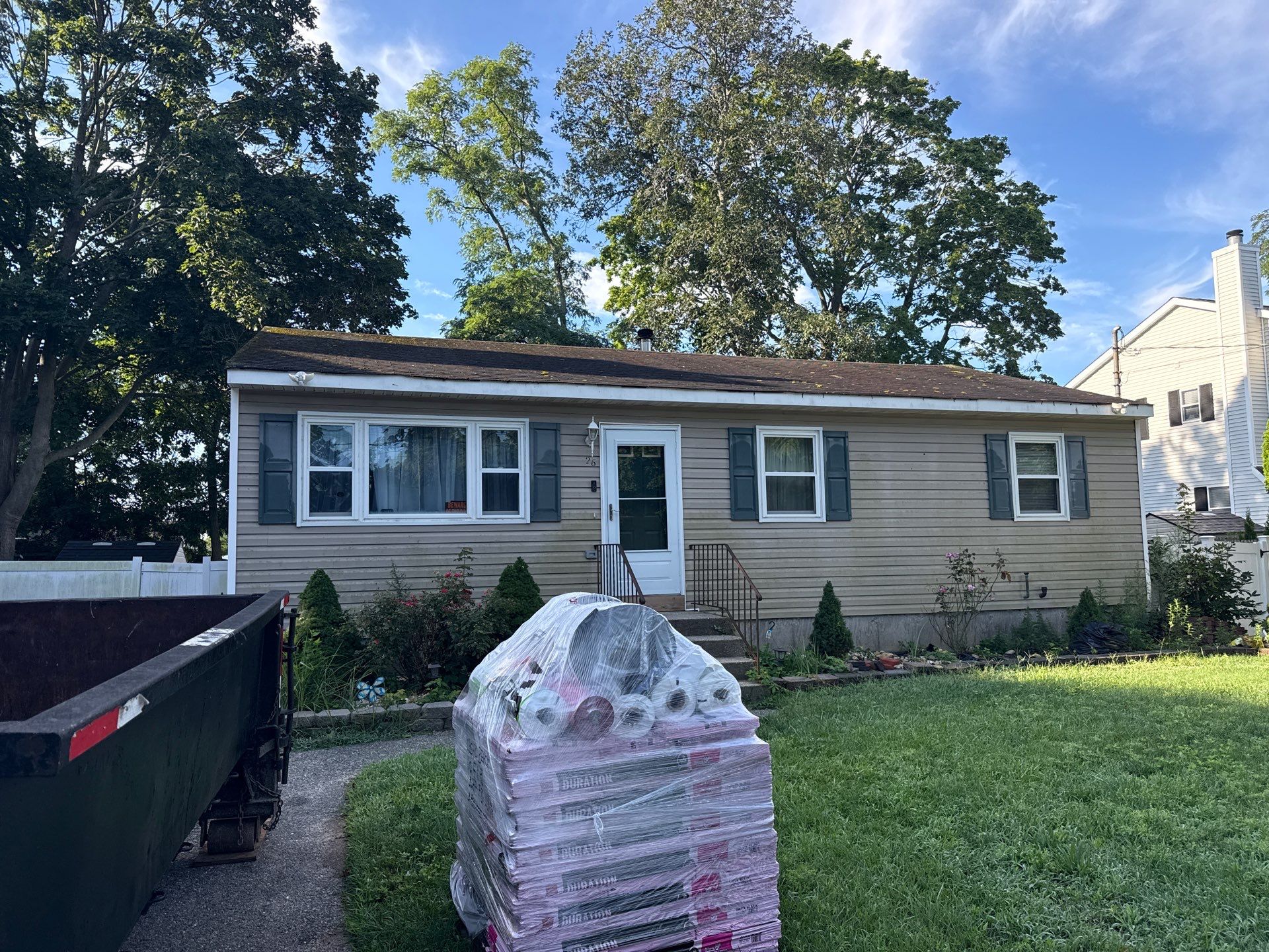 Asphalt Shingle Roof Replacement for Mastic Beach Residence by Smart Choice Contracting