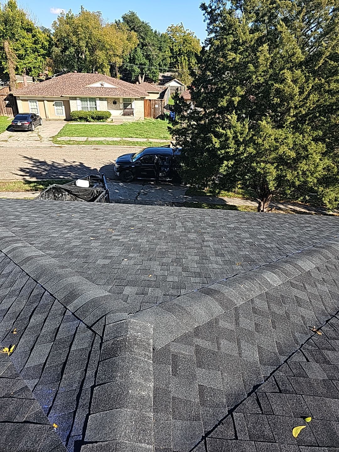 "Full Roof Replacement Due to Hail and Water Damage – Before & After" by road roofing llc