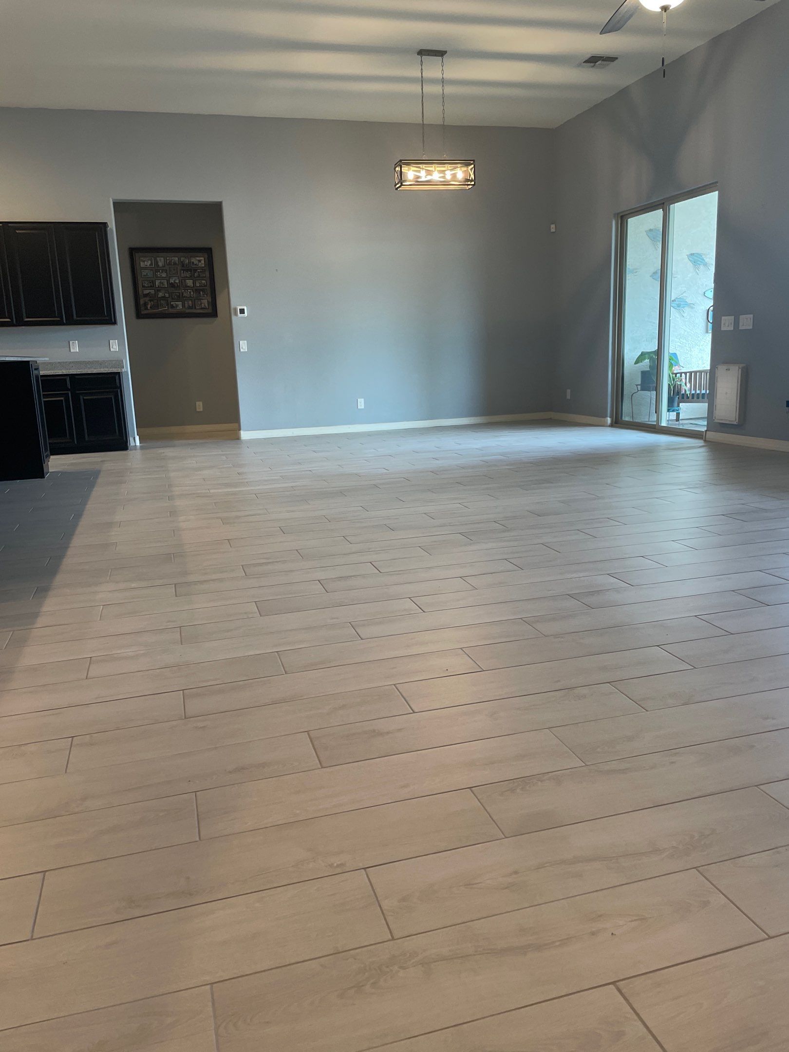 Wood Look Tile Floors and an Extra Large Shower  by Footprints Floors of Chandler 