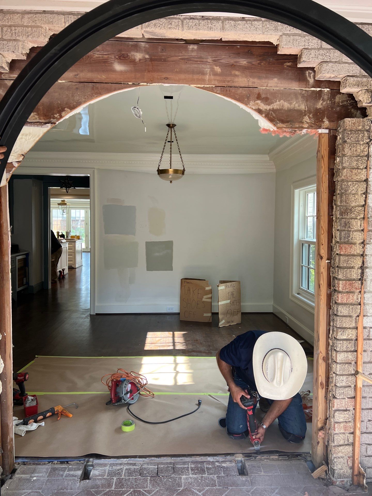 Custom Arched Black Wrought Iron Double Door Installation in Dallas by Solara Custom Living