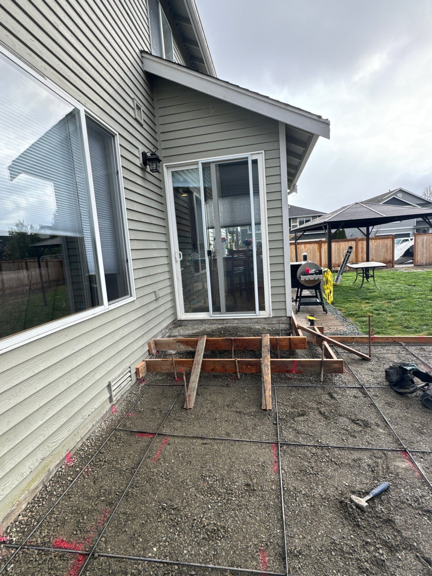 Benedict | Stamped Concrete Back Patio by Jireh Asphalt & Concrete Inc 