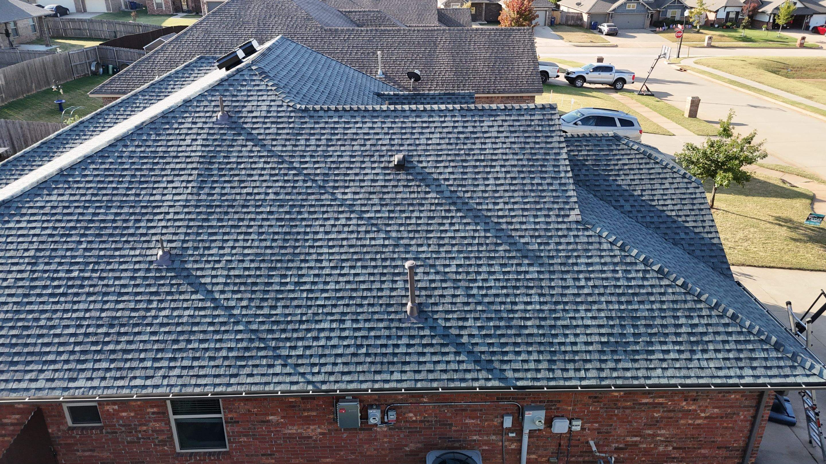 Roof Replacement in Mustang, OK by 5Coat Roofing & Construction