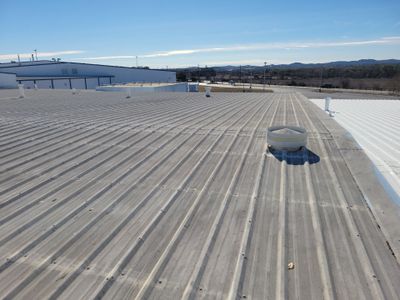 Wide view of a completed metal roof