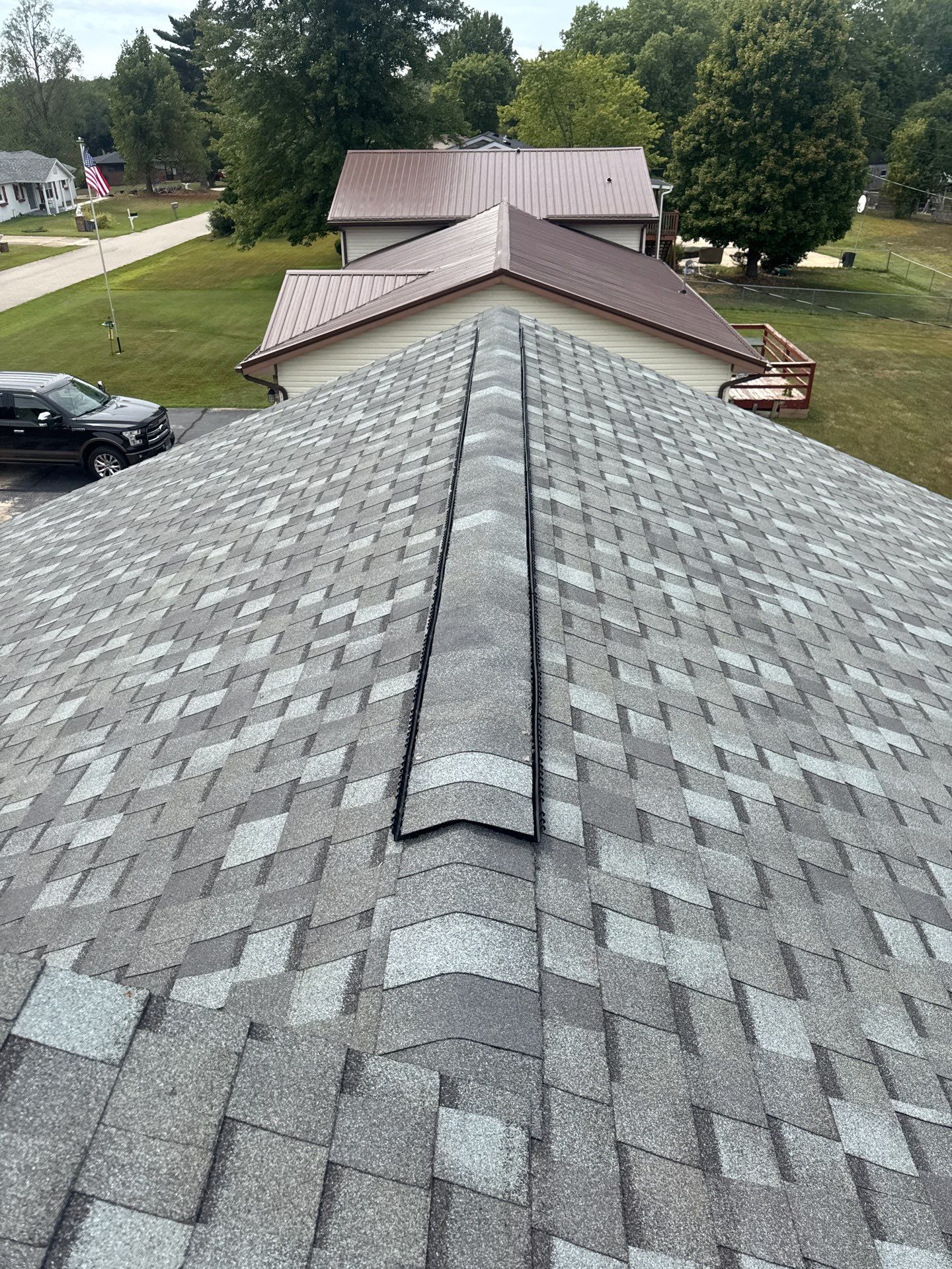 Residential Roof + Gutters & Downspouts Install  by Titan Commercial & Residential Roofing 
