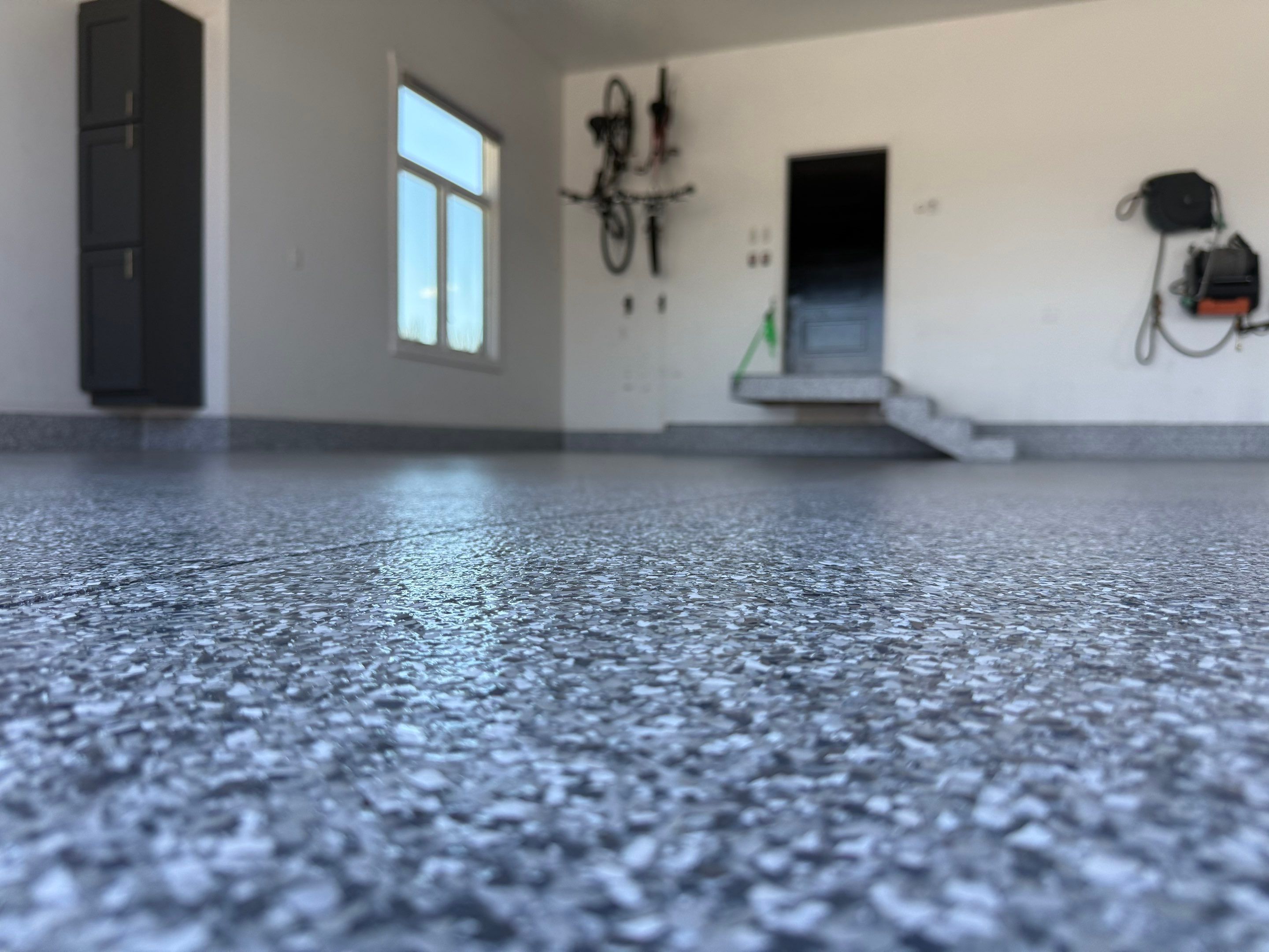 Gravel Flake Garage Floor Coating in Yankton by Select Painting, Coatings & Garage Cabinets