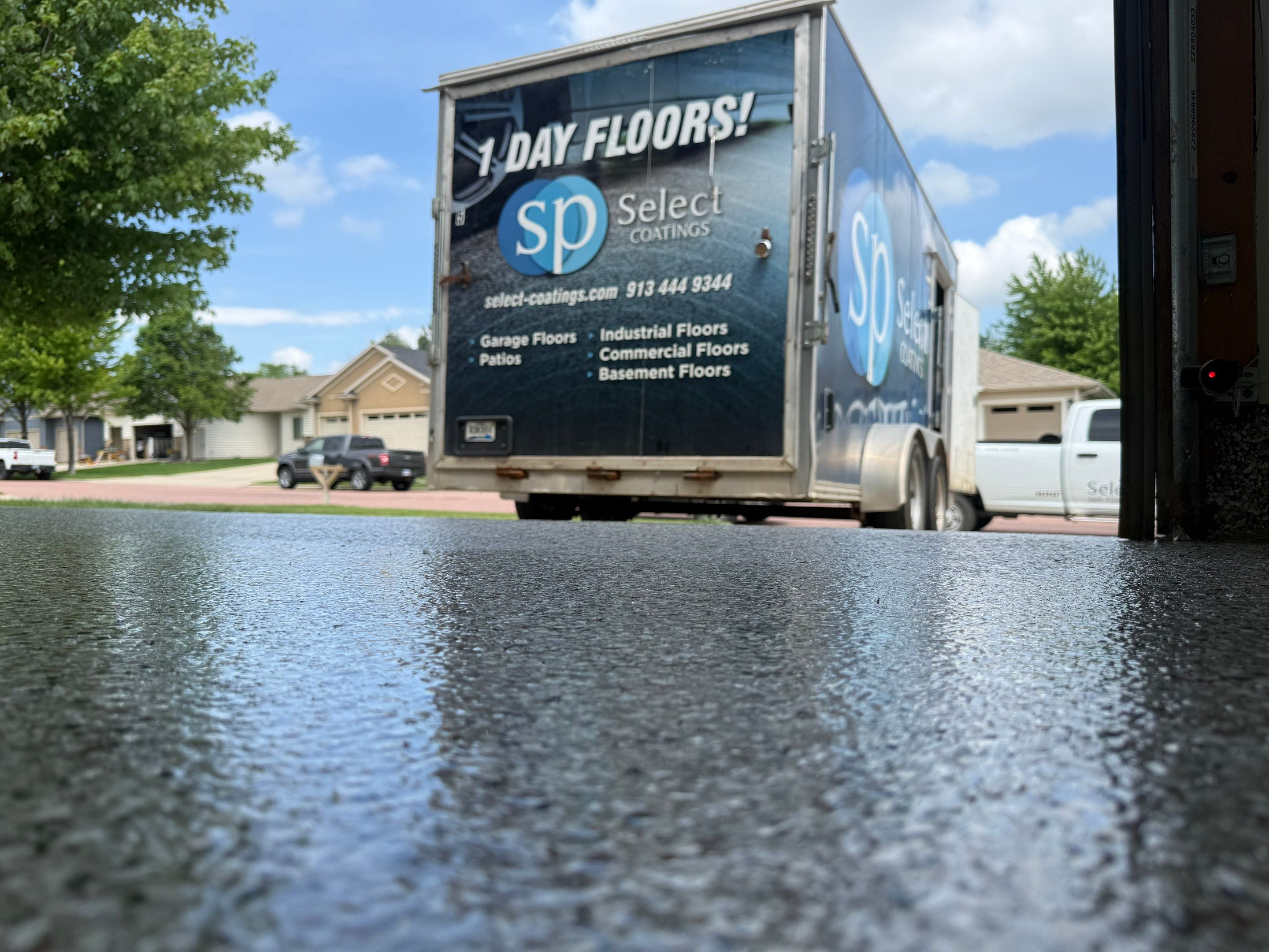Full Garage Floor Resurfacing and Decorative Epoxy Flake Finish by Select Painting, Coatings & Garage Cabinets