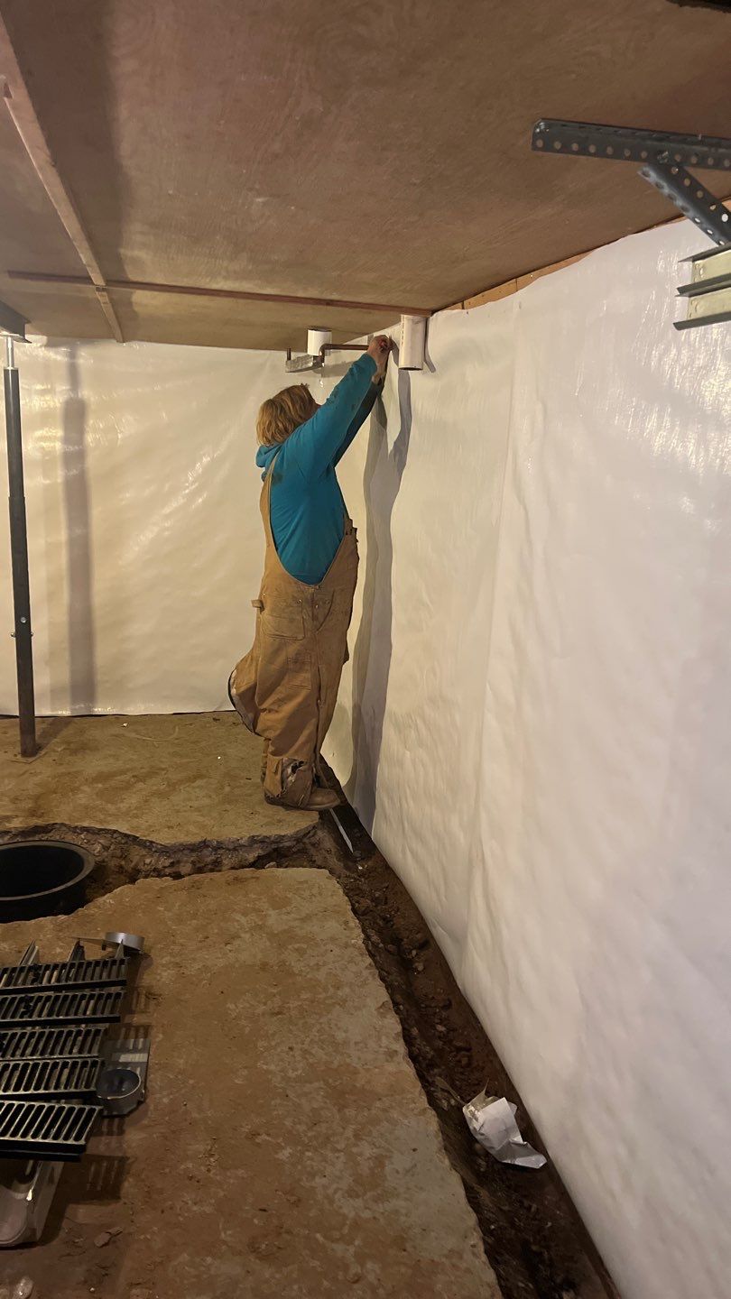 Basement Waterproofing using Drain tile system and a foundation wrap by ACE Waterproofing & Basement Solutions