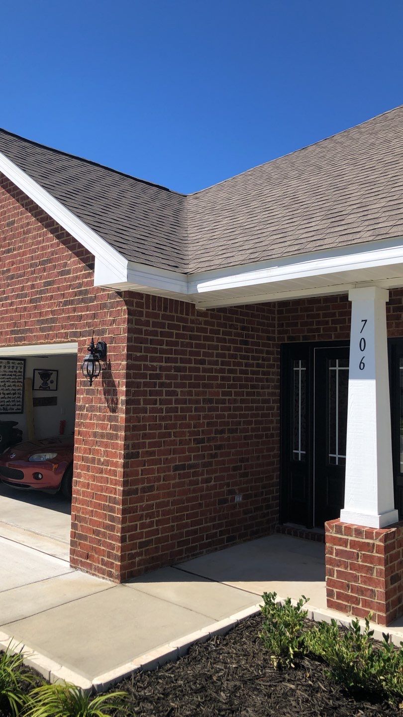 Seamless Gutter Installation using White K-Style Gutters by Gutter Professors
