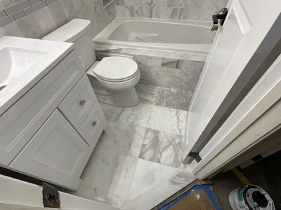 Bathroom Remodel using Two new bathroom design and new floors