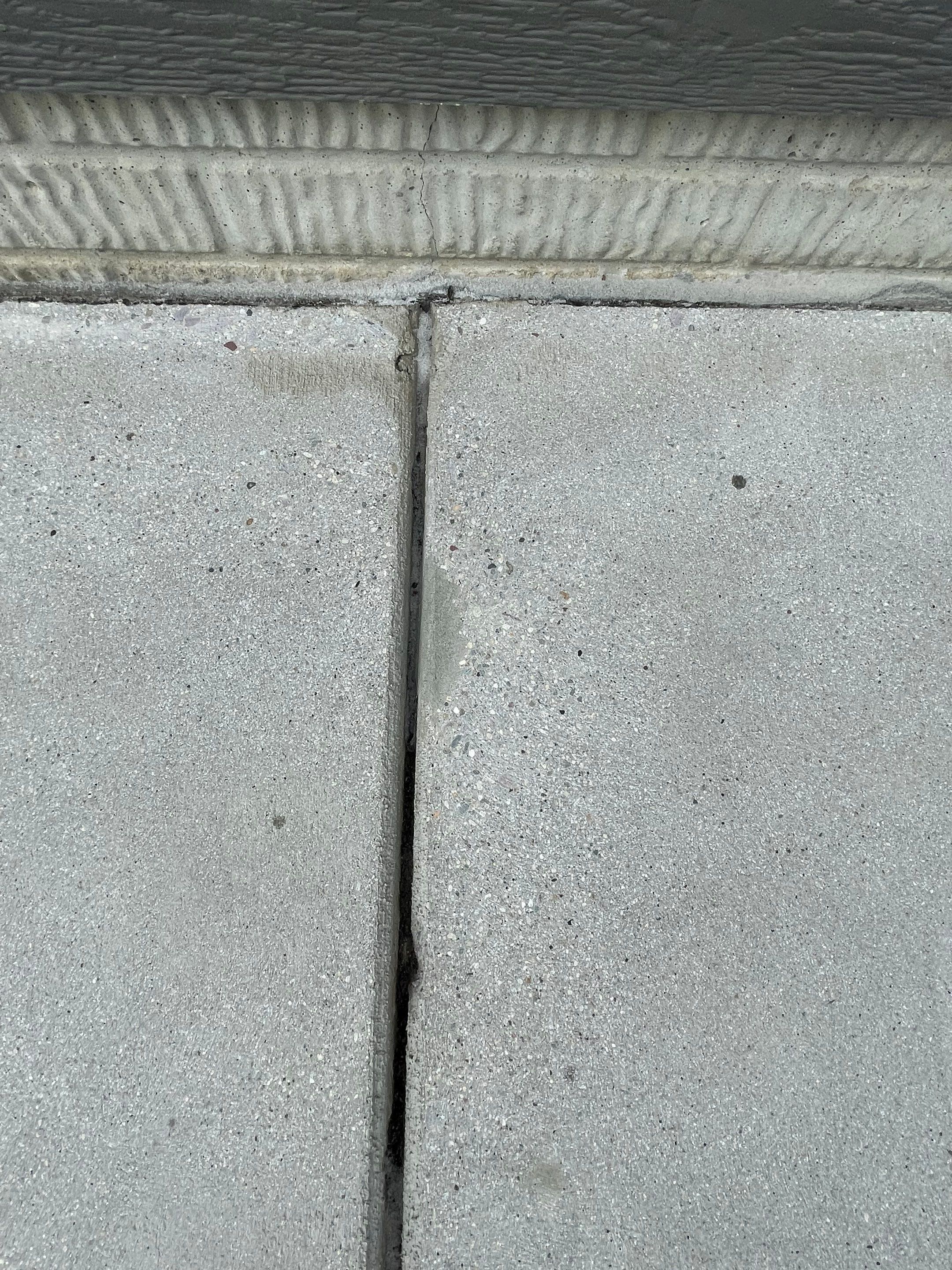 Custom Concrete Coating for Sioux Falls Patio and Front Walkway by Select Painting, Coatings & Garage Cabinets