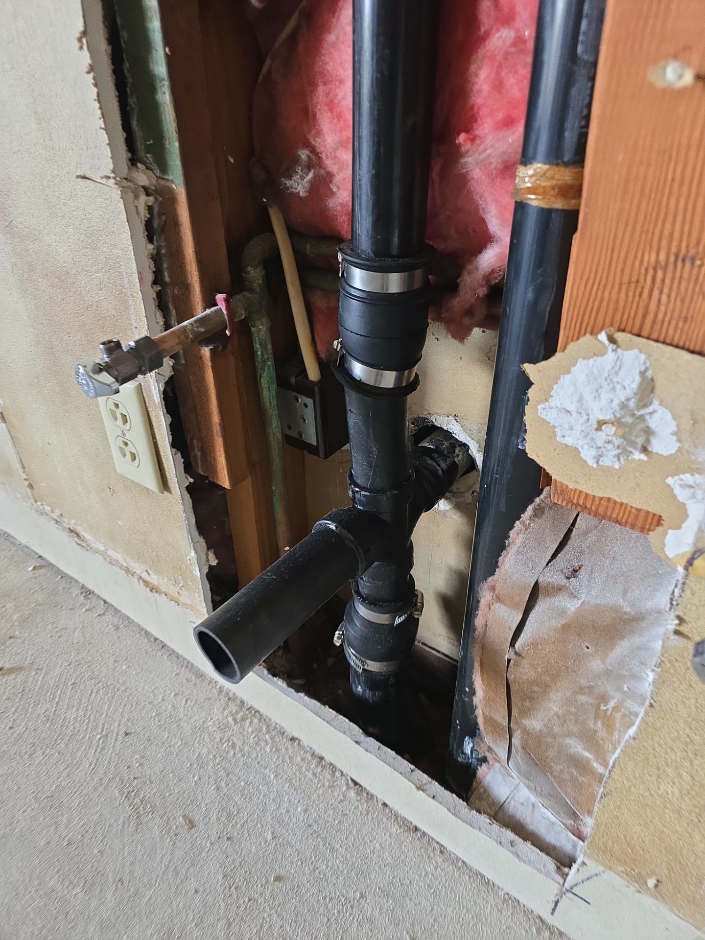 Scope of Work: Installation of Shower, Toilet, Plumbing, Kitchen Sink, and Fixtures by Us Plumbing 