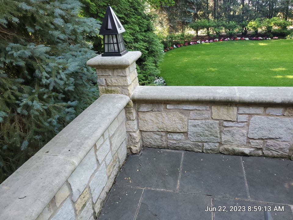 Northbrook, IL stucco home soft wash and stone cleaning by Northern Power Washing LLC.