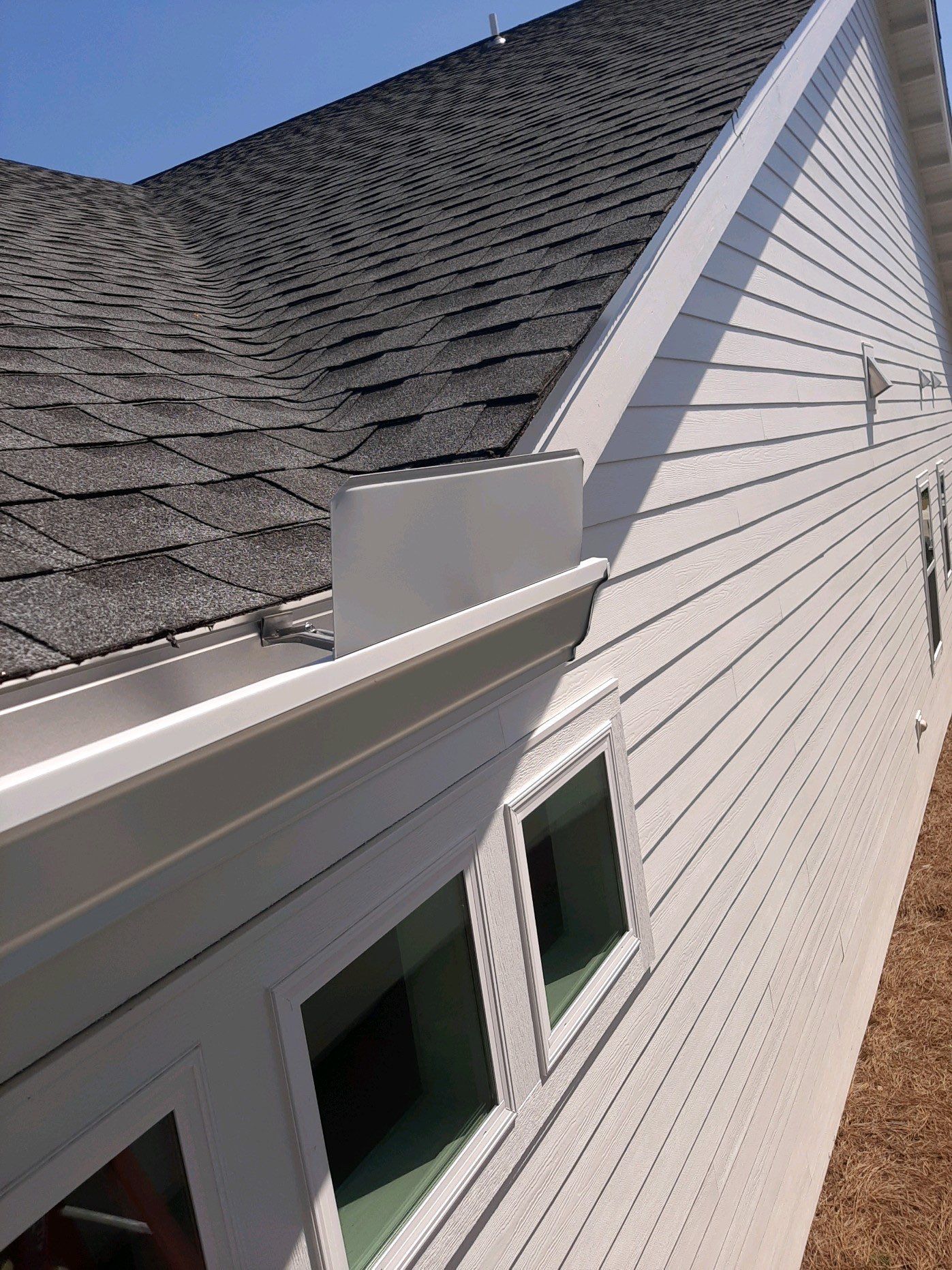 Gutter Installation Using White K-Style Aluminum Seamless Gutters by Gutter Professors