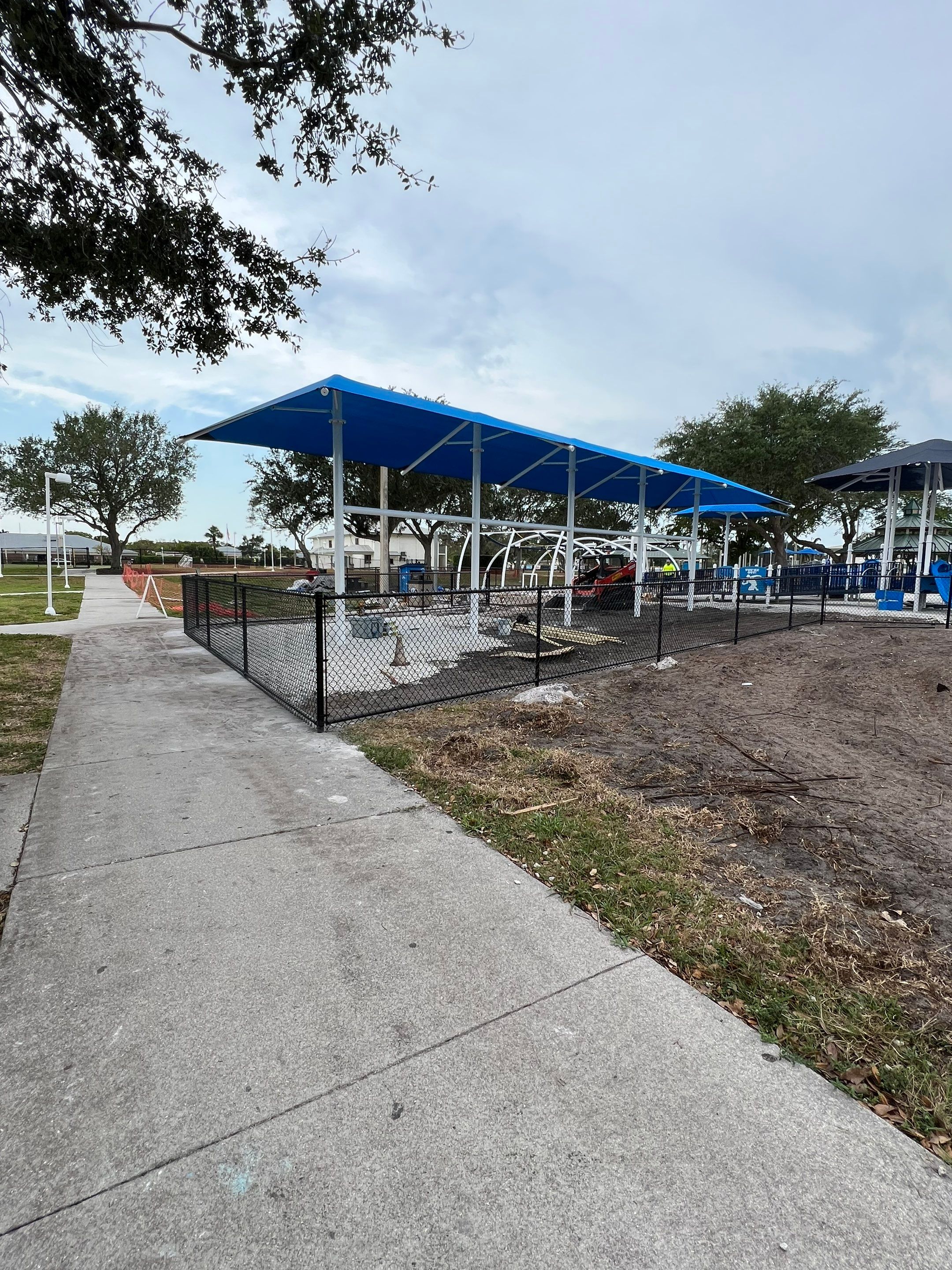 Vinyl Coated Chain-link fence for the City of Naples around Fleischmann Park Playground.  by Asap fence and gates, LLC