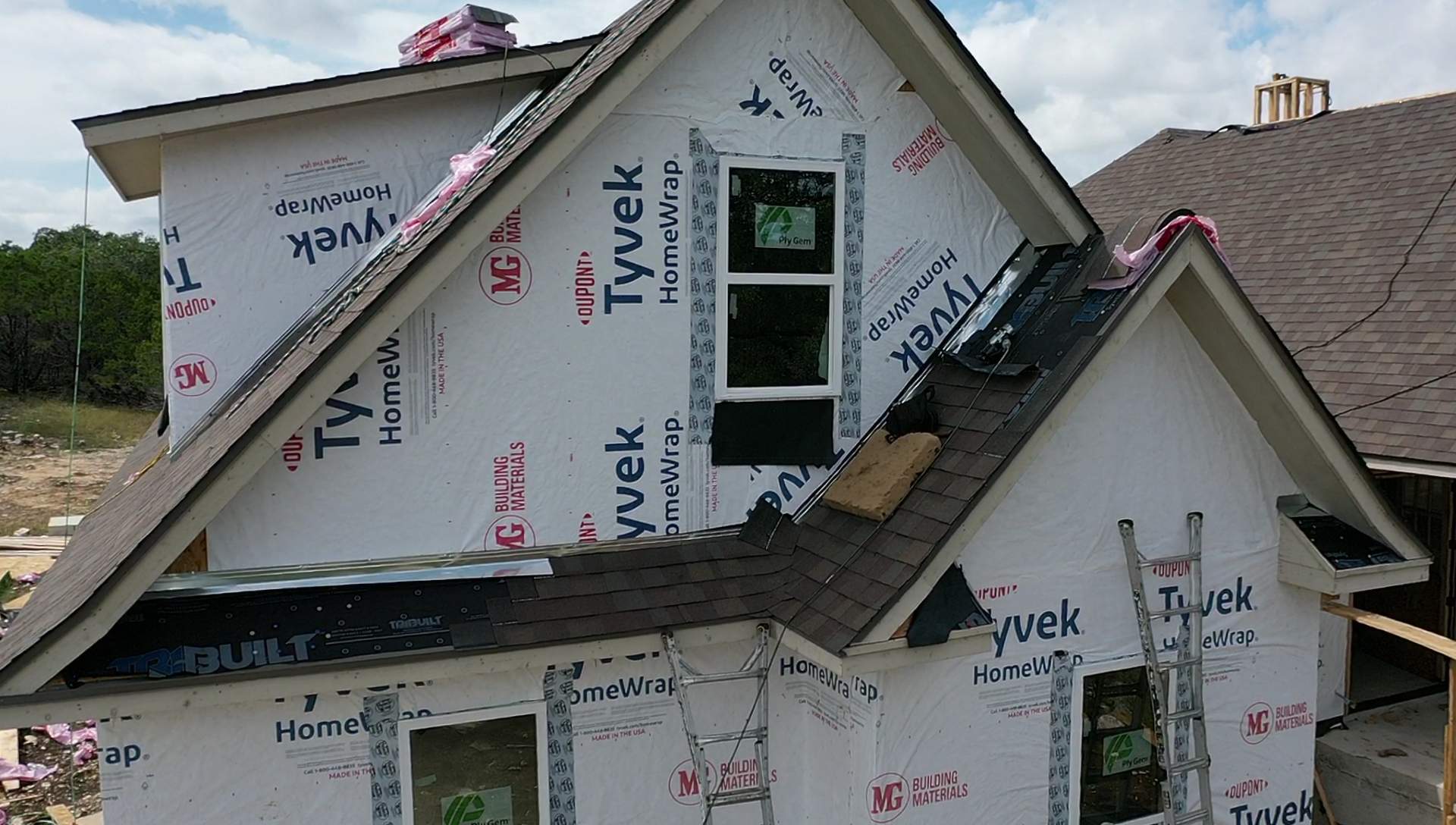 New Home Construction using Owens Corning 30 year Architectural Shingles by Premier Roofing and Contracting