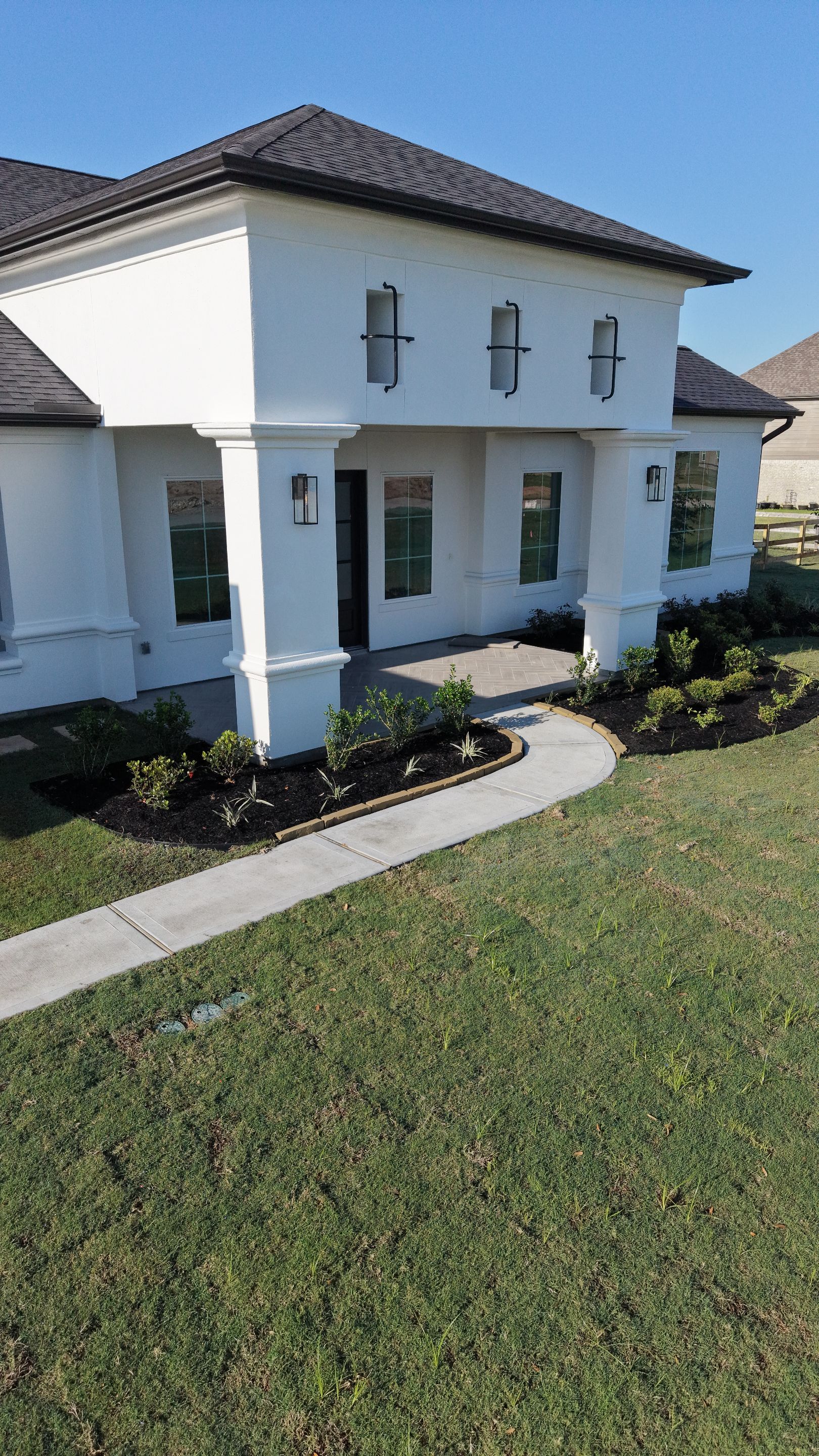 Custom Stucco Masterpiece with Precision Foam Detailing – Waller, TX by Apex Conventional Stucco Llc