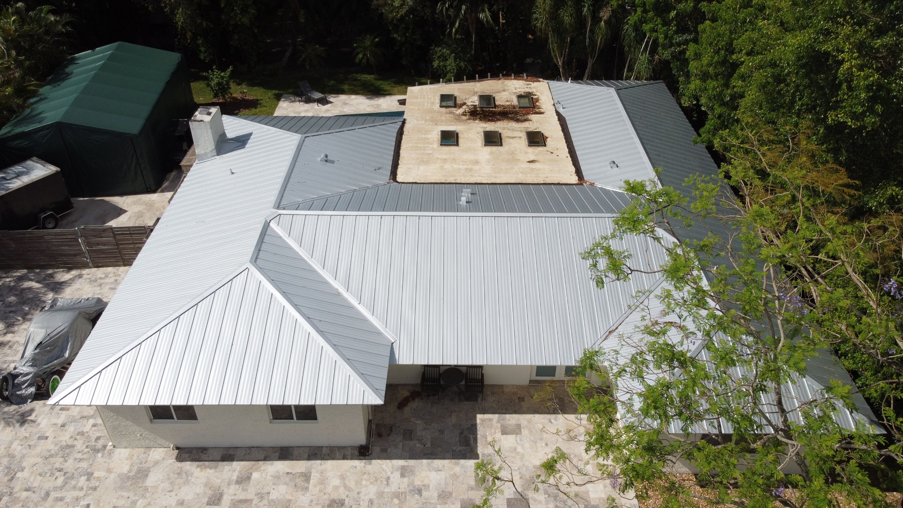 Residential Roofing Installation using 1" Nail strip metal roof by BLUES BROTHERS ROOFING