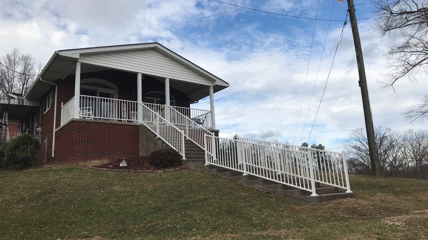 Porch Update using Westbury Aluminum Railing by Secure Construction Company Inc