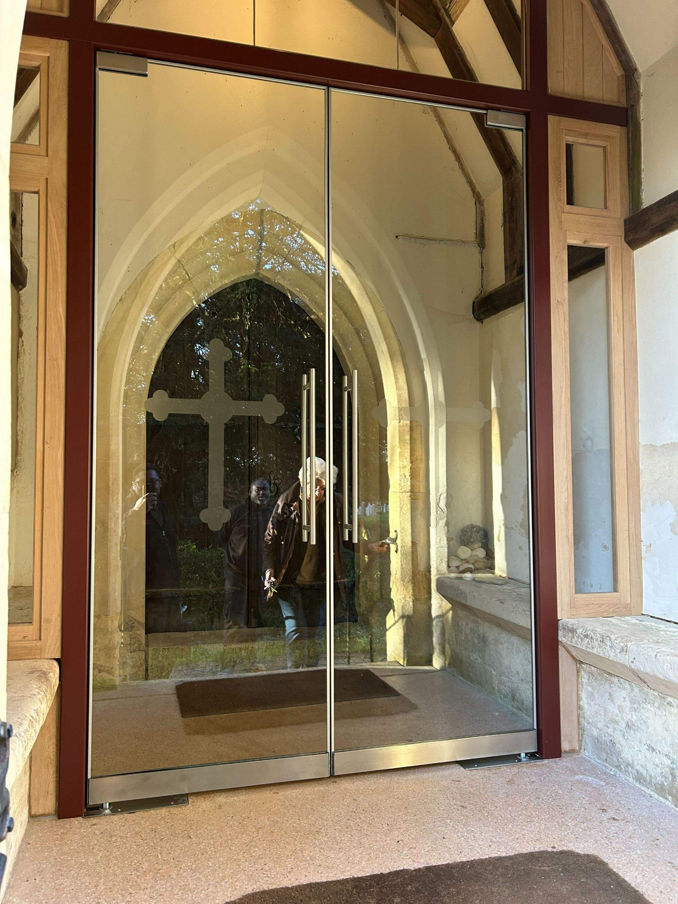 Case Study - Frameless Glass Church Entrance | Church of the Holy Ascension, Hyde 5 Inside View of Frameless Glass Doors at St Lawrence Church