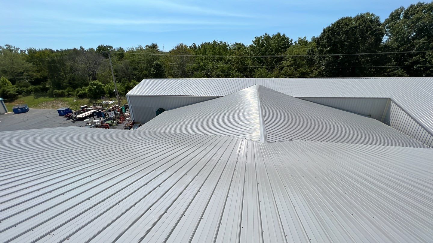 Commercial Metal Roof Replacement - 29 Gauge - Color Grey by Titan Commercial & Residential Roofing