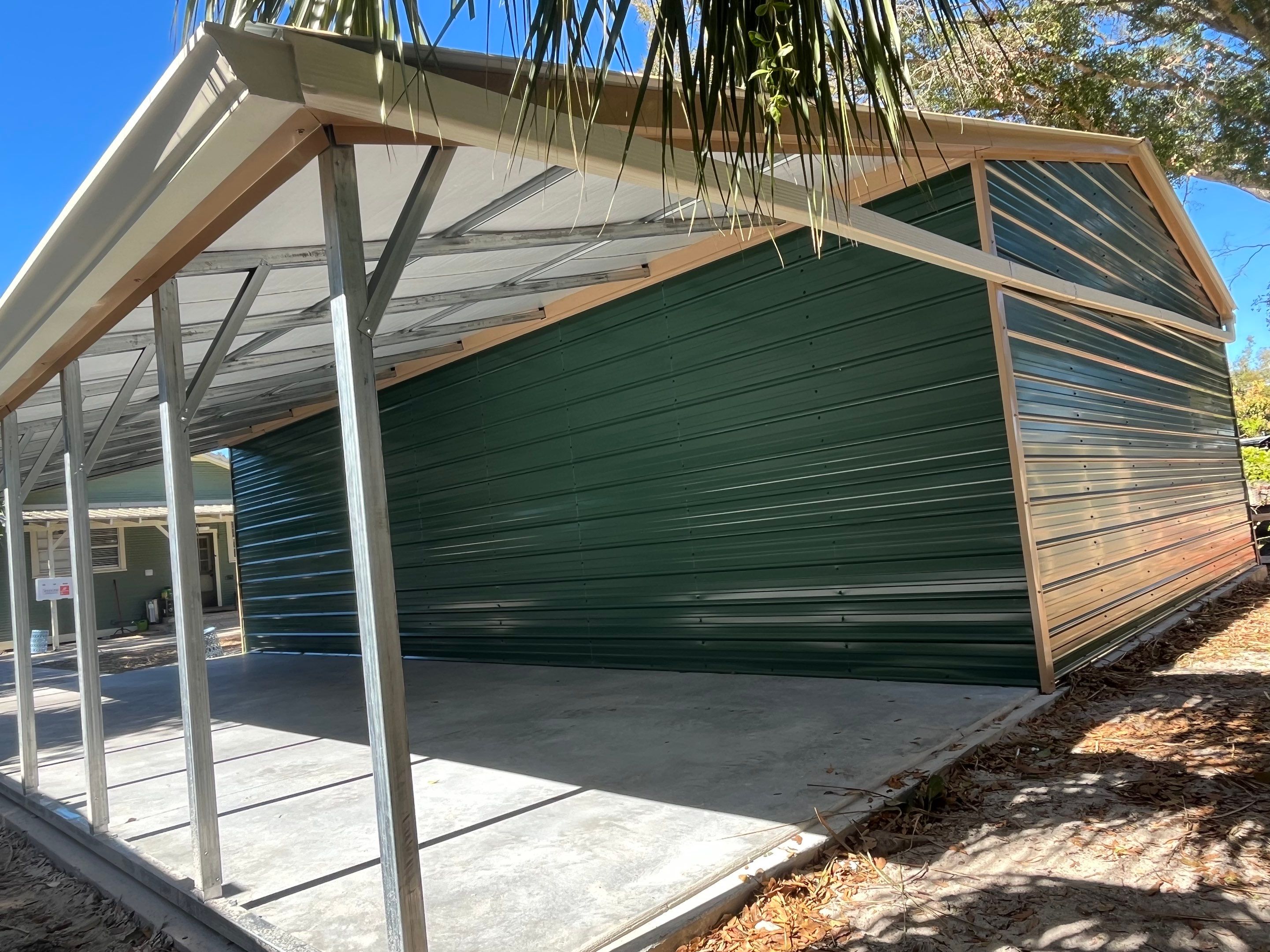 White 6-inch K-style Gutters and Down Spouts using Seamless Gutters White Down Spouts in Tampa FL by Gutter Professors