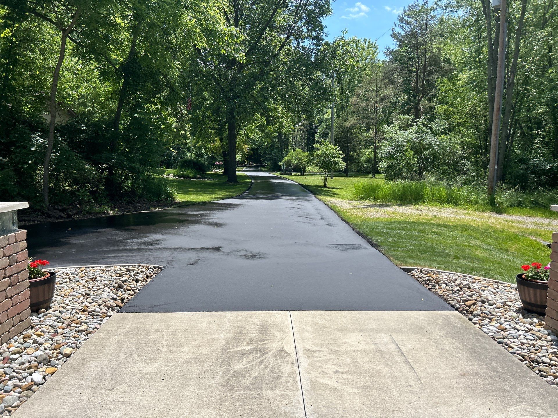 High end residential driveway by Quality Asphalt & Maintenance LLC