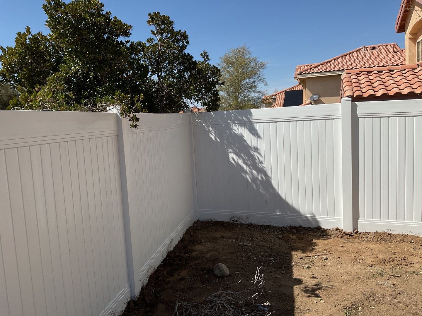 Fence installation using vinyl material by Fence Guys Inc. 