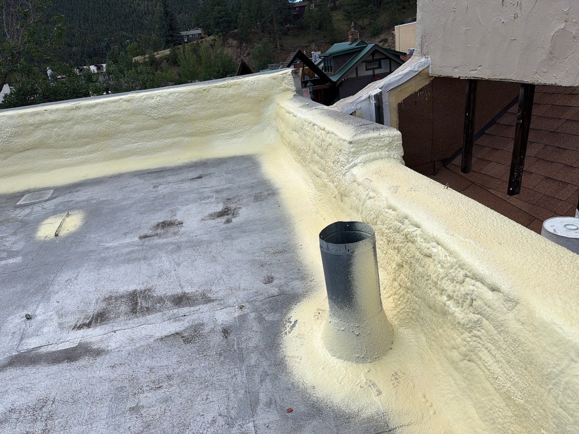 Estes Park "The Taffy Shop" Before & After Gaco Coating by Blue Peaks Roofing LLC