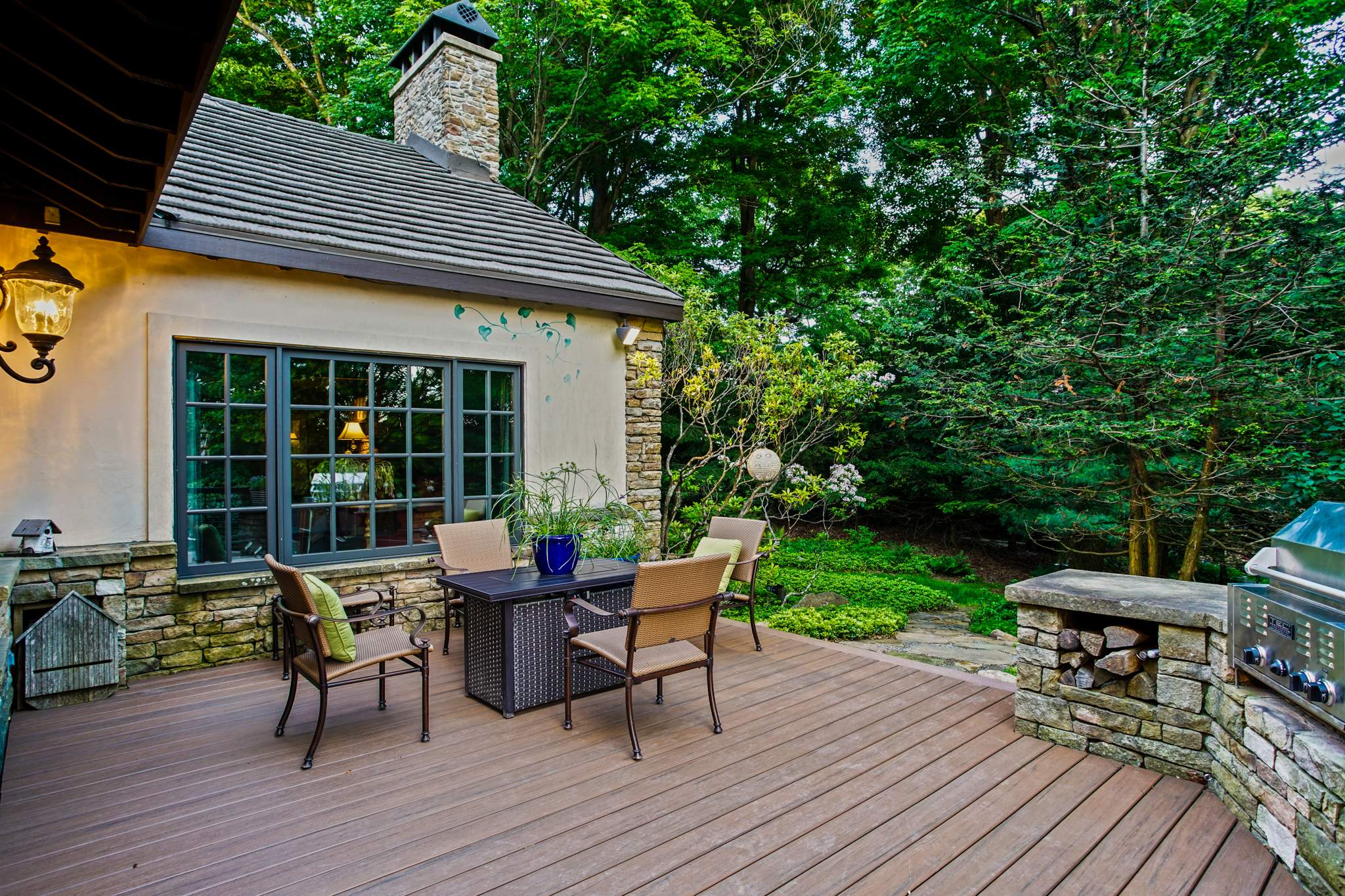 1500 sq/ft Composite Deck Build with Outdoor Kitchen in Champion by Cousins Roofing Siding & Decks