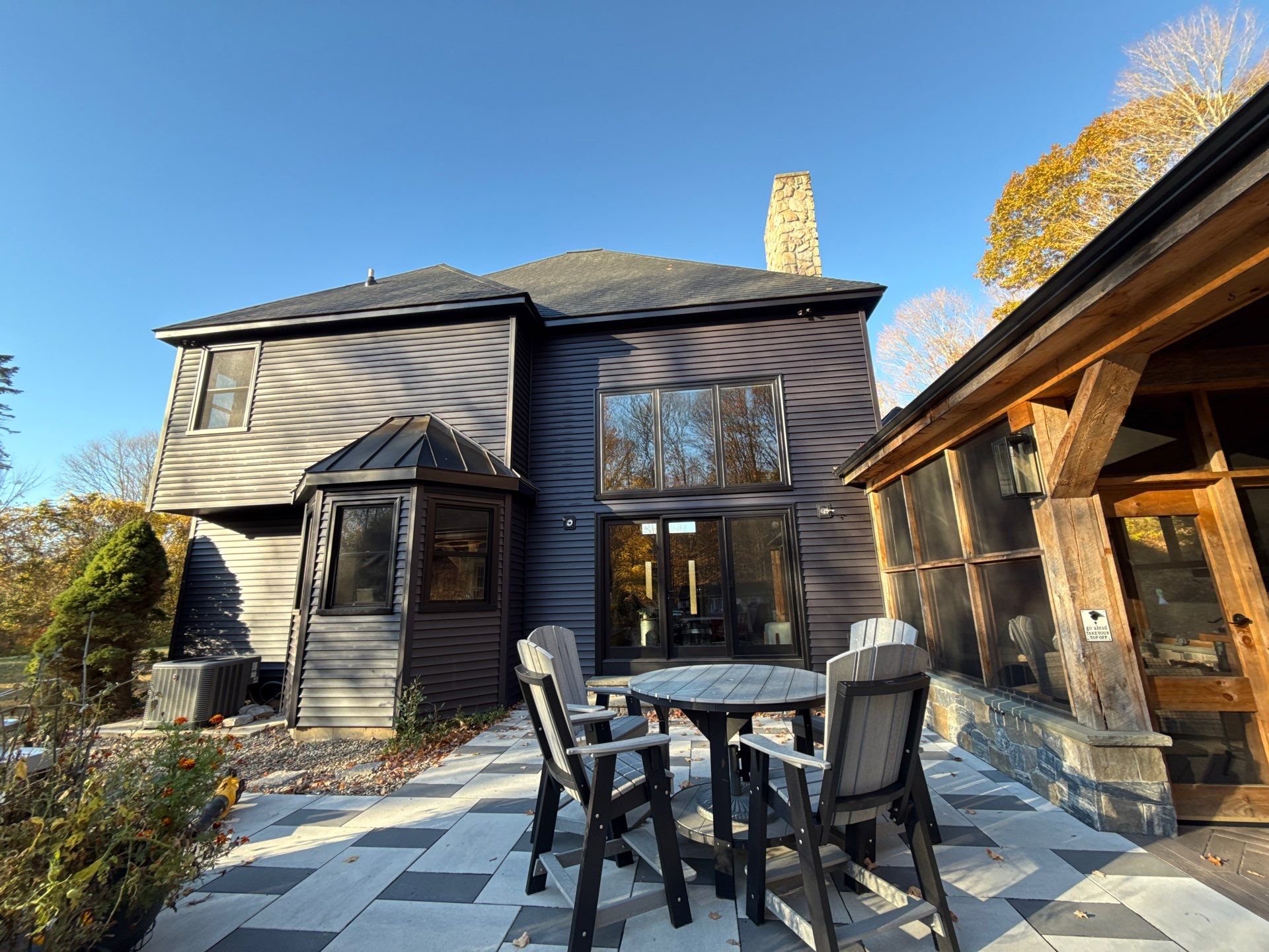 Bold Siding transformation with Cert Cedar Board & Batten S12, White, and Cert Monogram D/4 x 12'6" clapboard, Tuxedo by DiGiorgi Roofing and Siding Inc