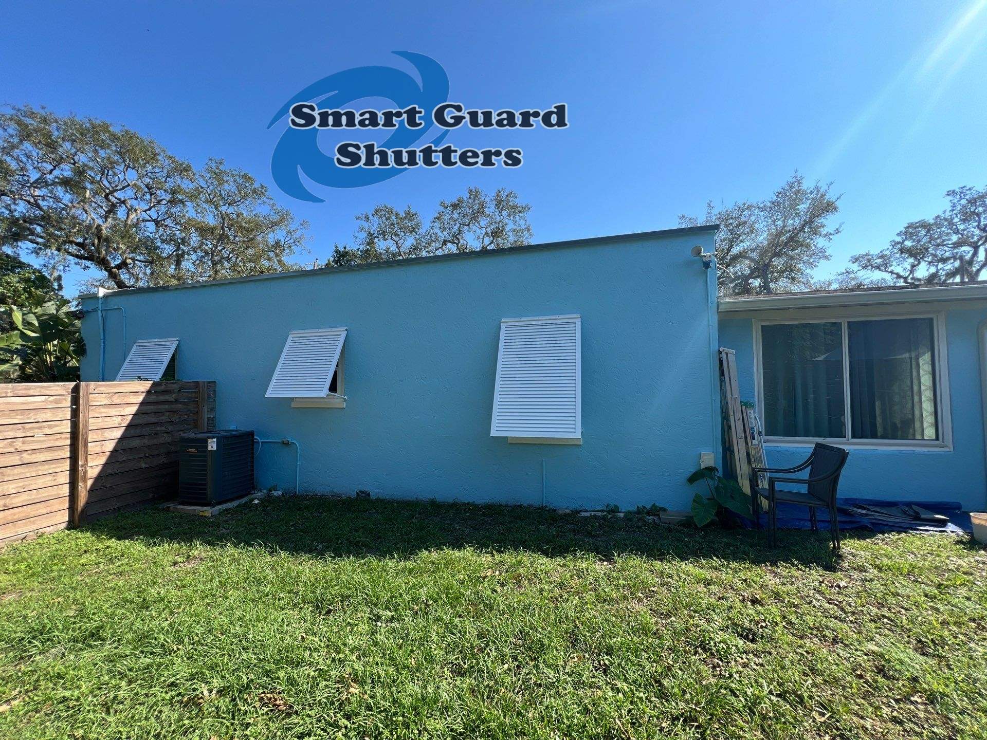 Decorative Bahama Shutters in Signal White  by Smart Guard Shutters