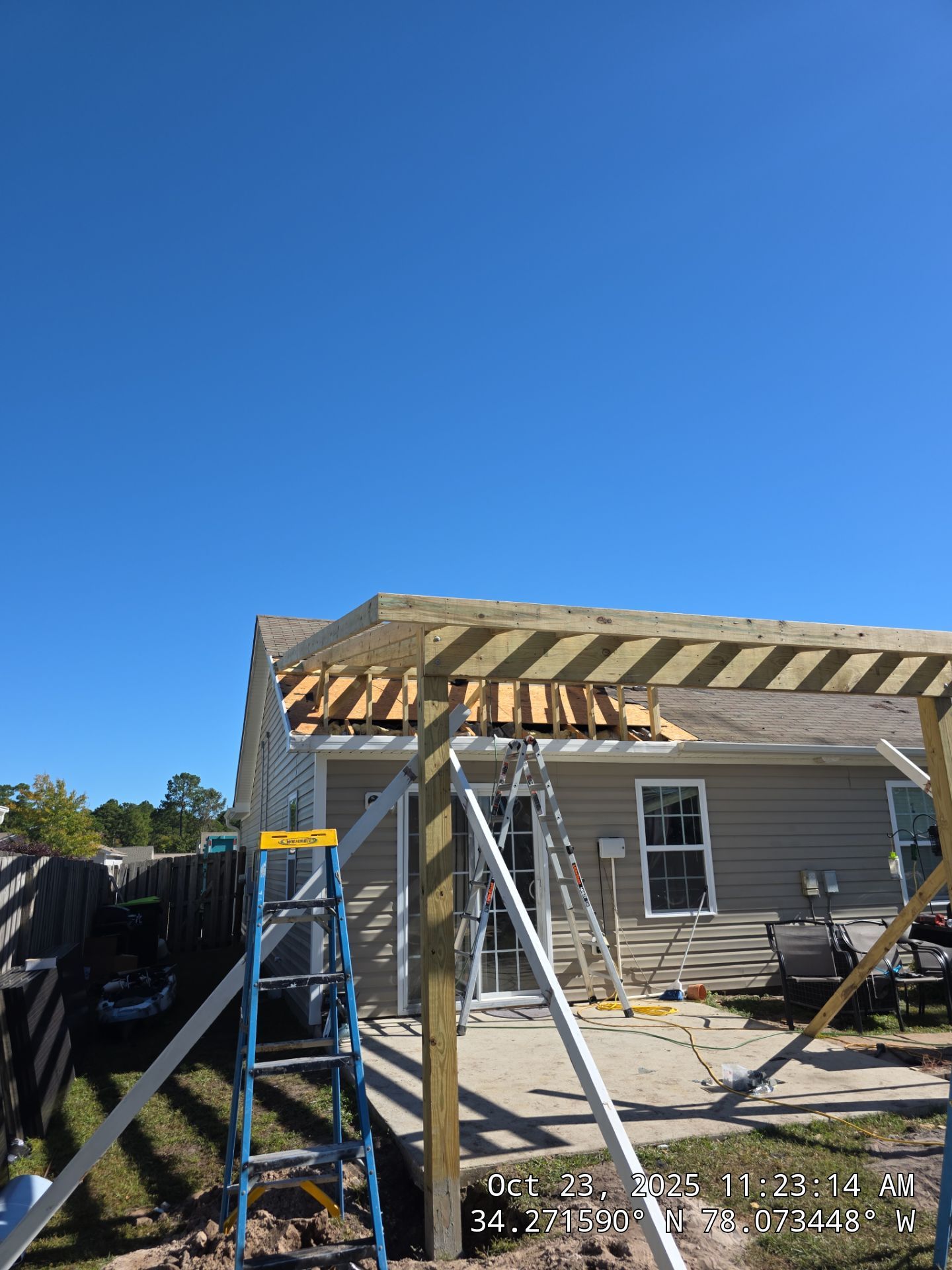 Covered Porch Build and Fortified Roof Replacement with Solar Panels by RGR Construction and Roofing, LLC