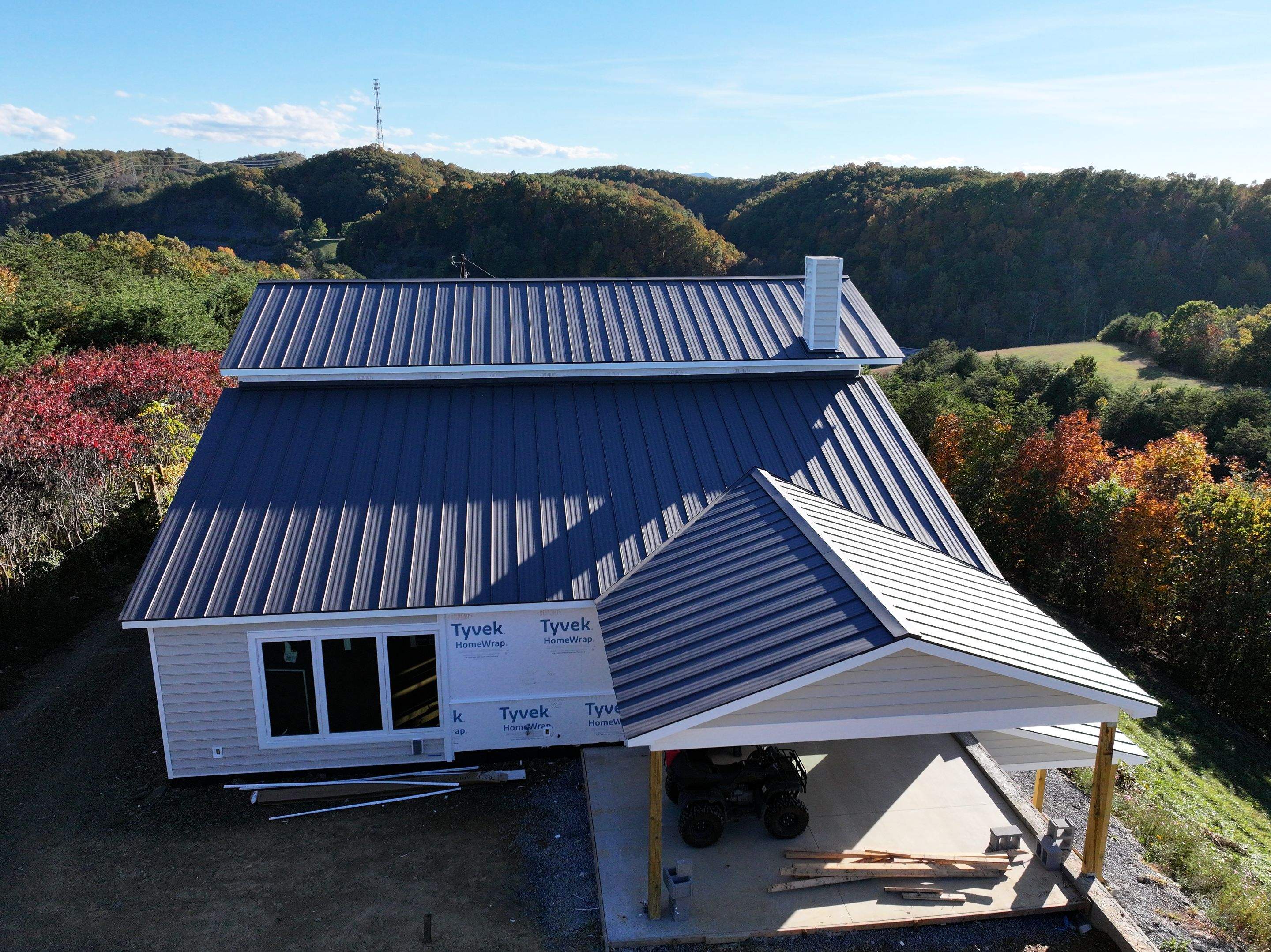 Textured Charcoal Gray Standing Seam by Omnia Roofing