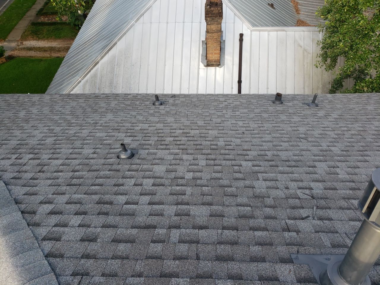 Residential Roofing Installation by American Roofing & Construction LLC