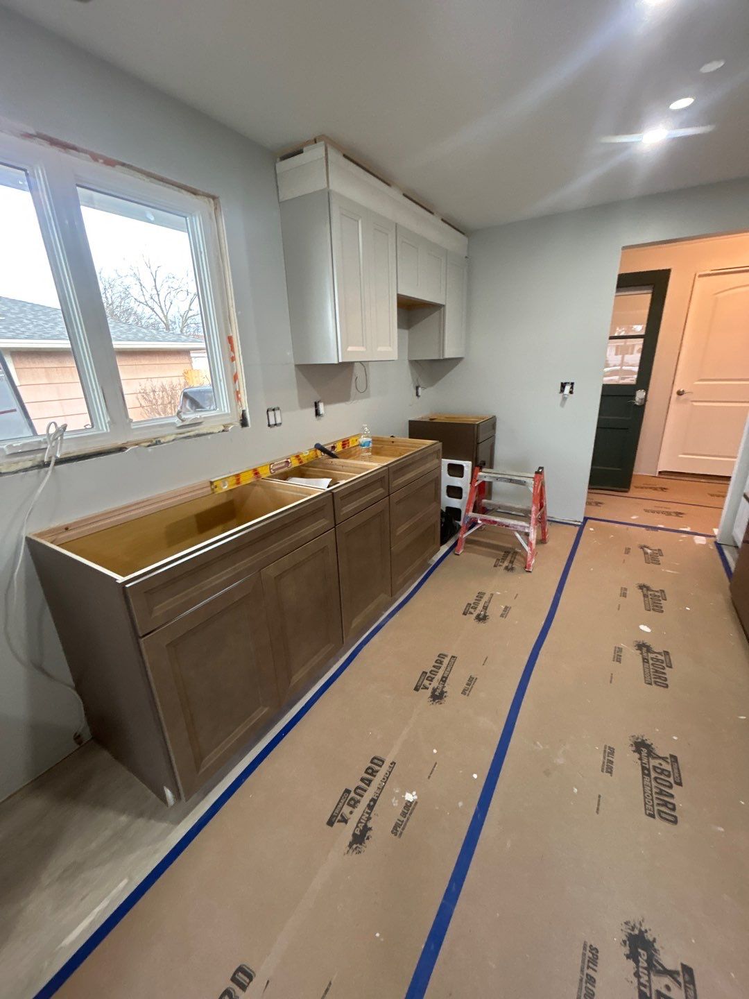 Interior Renovations, Kitchen Remodel, and Window Replacement by Ivy Lea Construction