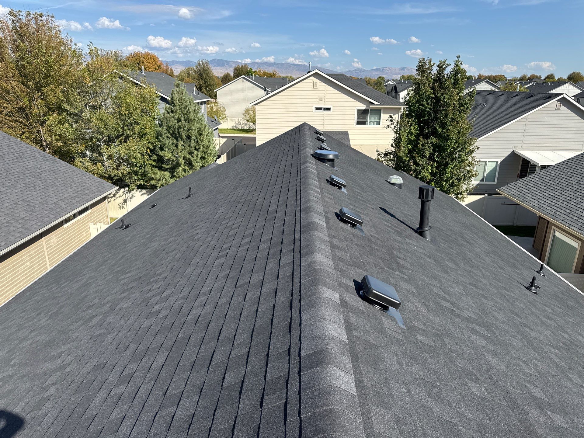 Residential Roof Replacement With Charcoal Architectural Shingles in Meridian by Olive Roofing