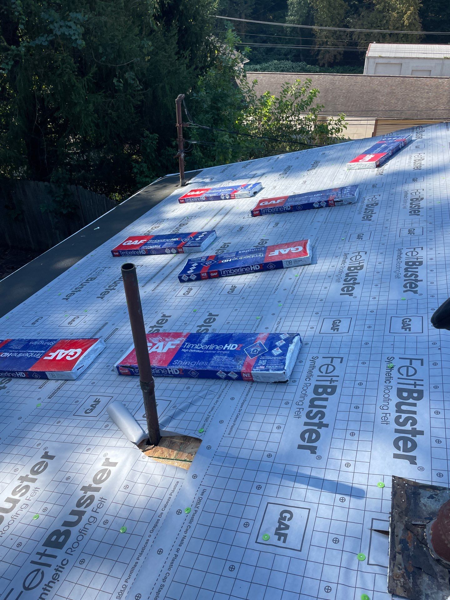 Residential Roofing Installation using GAF TImberline HDZ Hickory by Rainstoppers Roofing