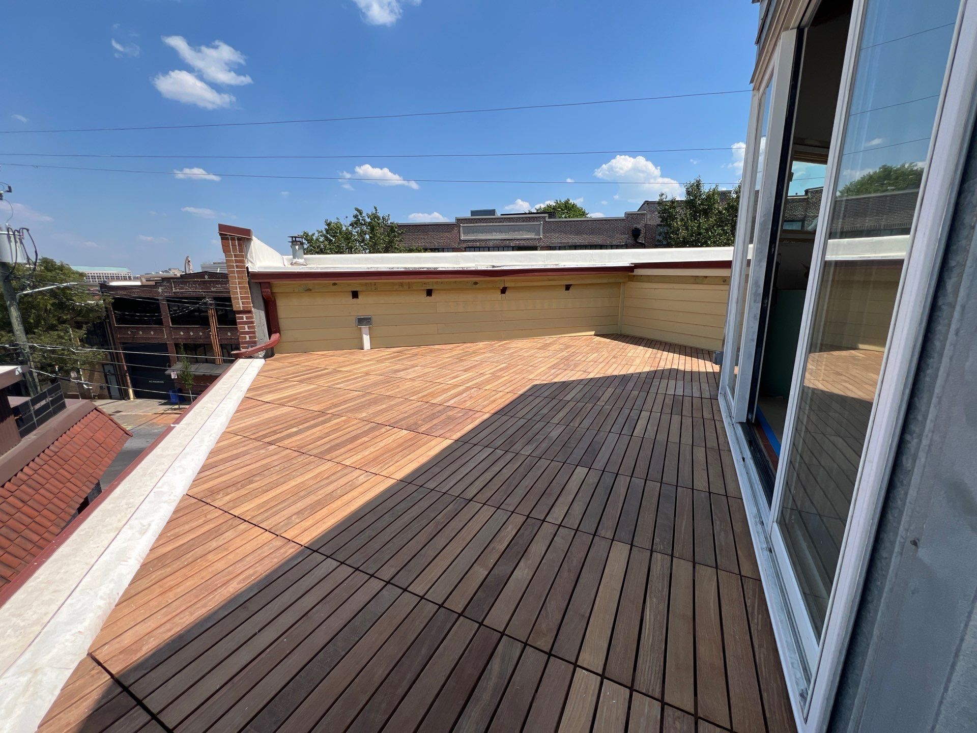 Atlanta Rooftop Deck Renovation with Modular Wood Slat Tiles by Swift Home Renovations