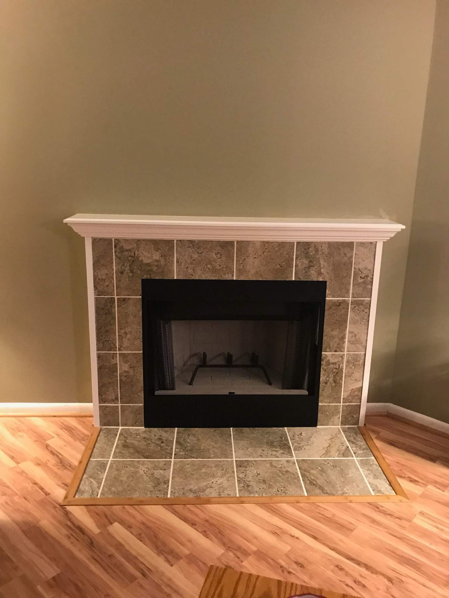 Wood Fireplace + Tile + Mantel by Premier Chimney and Roofing