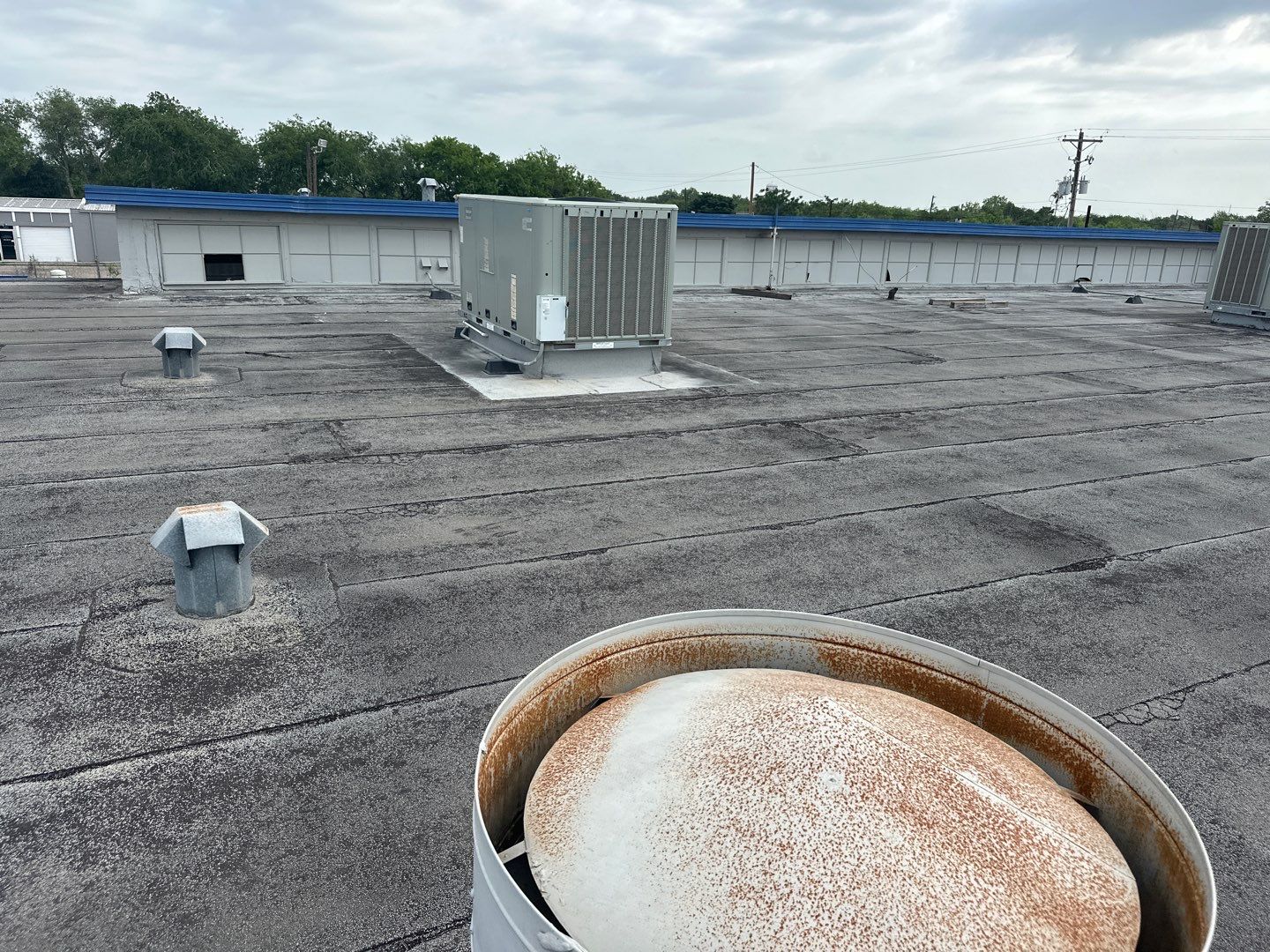Commercial Silcone Roof Repair using Silcone Coating by Galvan Roofing and Construction