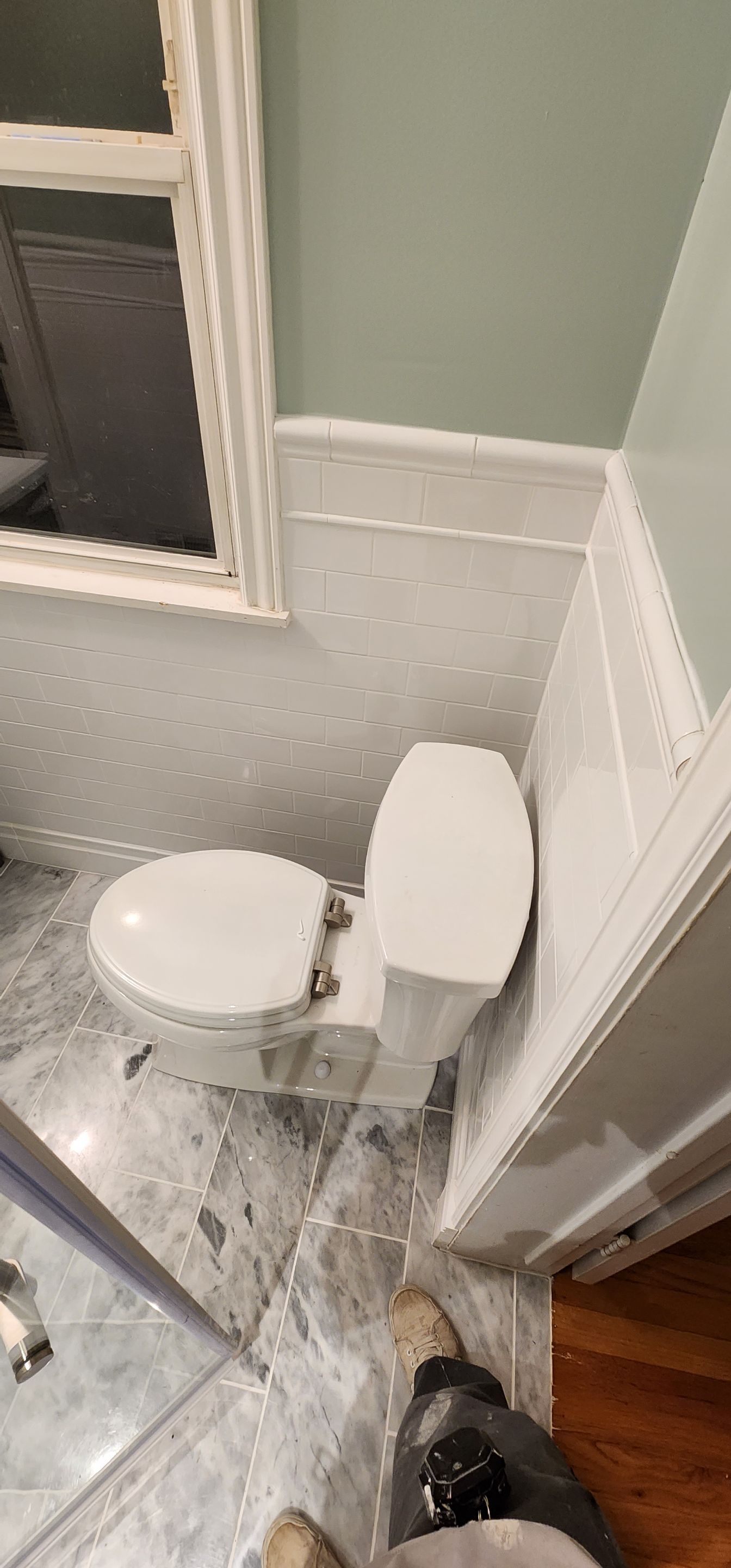 Full bathroom, tile shower, tile floor, tile wainscoting by The Shower Company