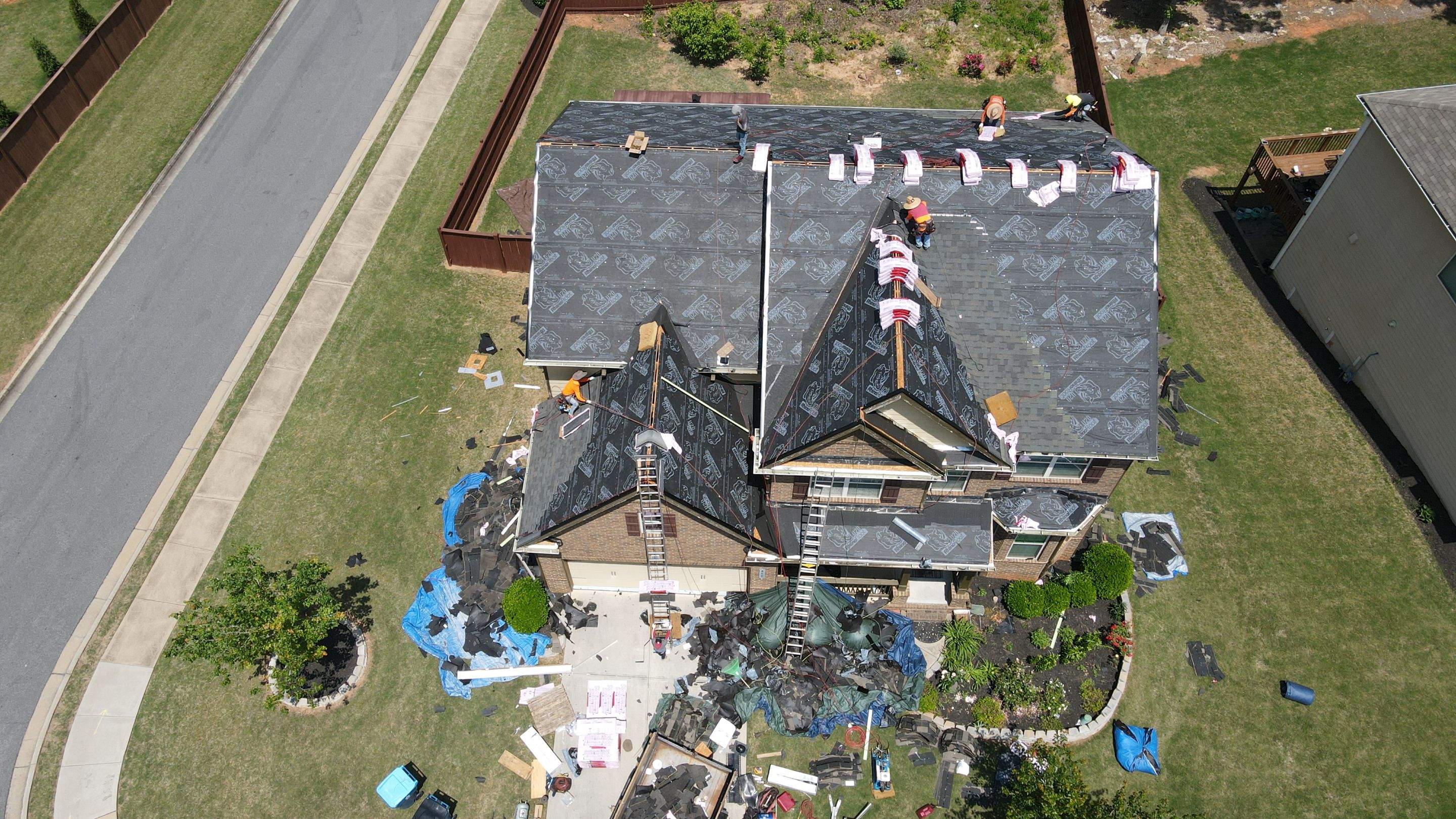 Residential Roofing Installation using Owens Corning TruDef Peppermill Gray by Inspector Roofing and Restoration
