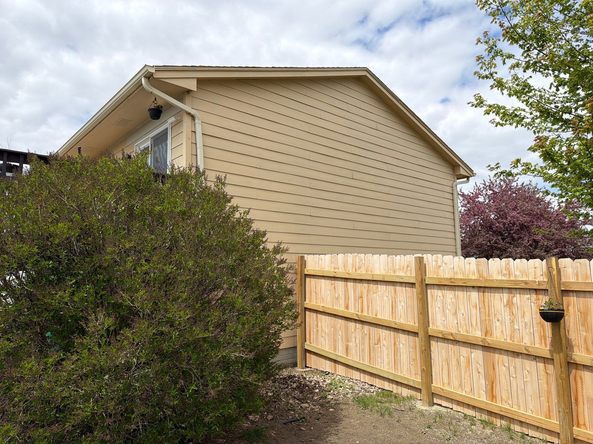 Exterior Painting and Siding Restoration for Harrisburg Residential Home by Select Painting, Coatings & Garage Cabinets