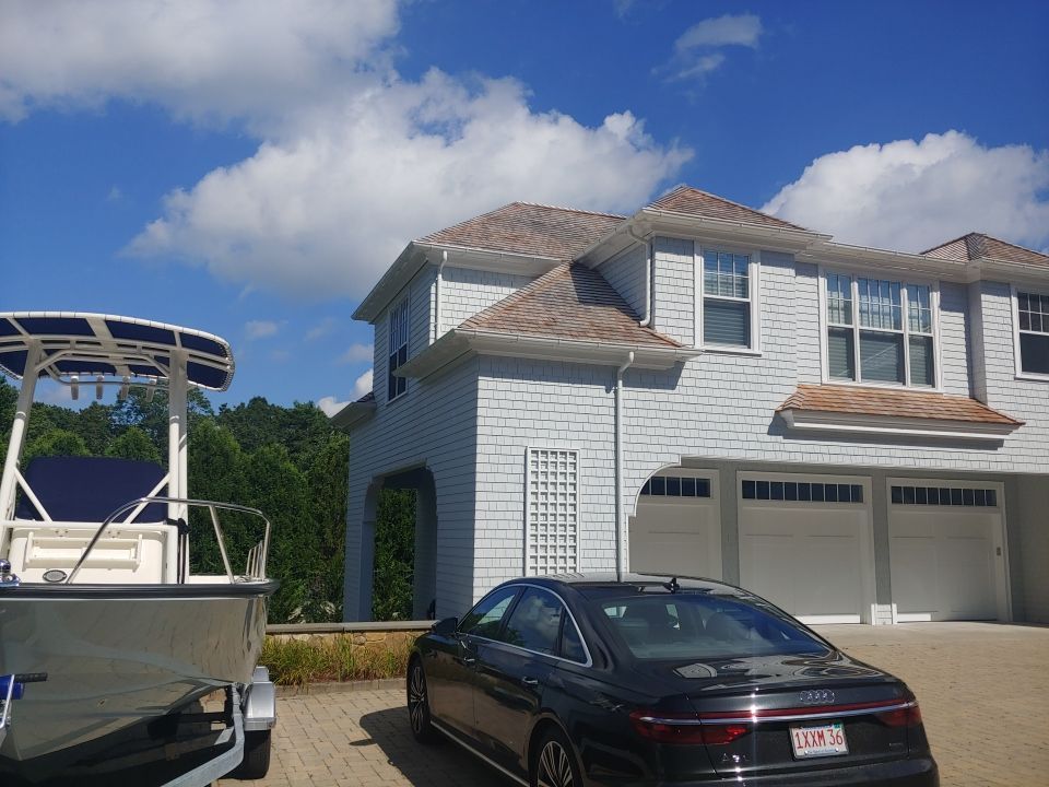 Gutter Installation using 6" Half Round Aluminum Gutter over Crown Moulding by Gutter Pro Enterprises