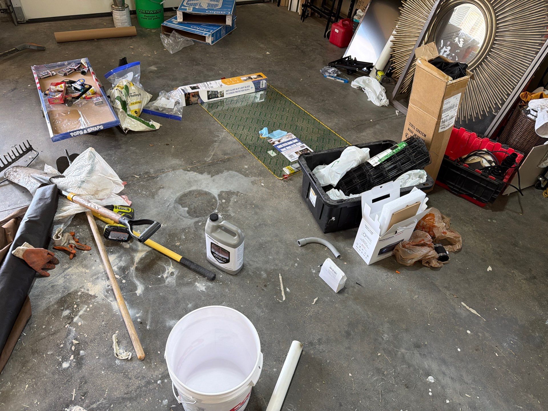 Cabin FEver Flake Garage Floor Coating Installation in Sioux Falls by Select Painting, Coatings & Garage Cabinets