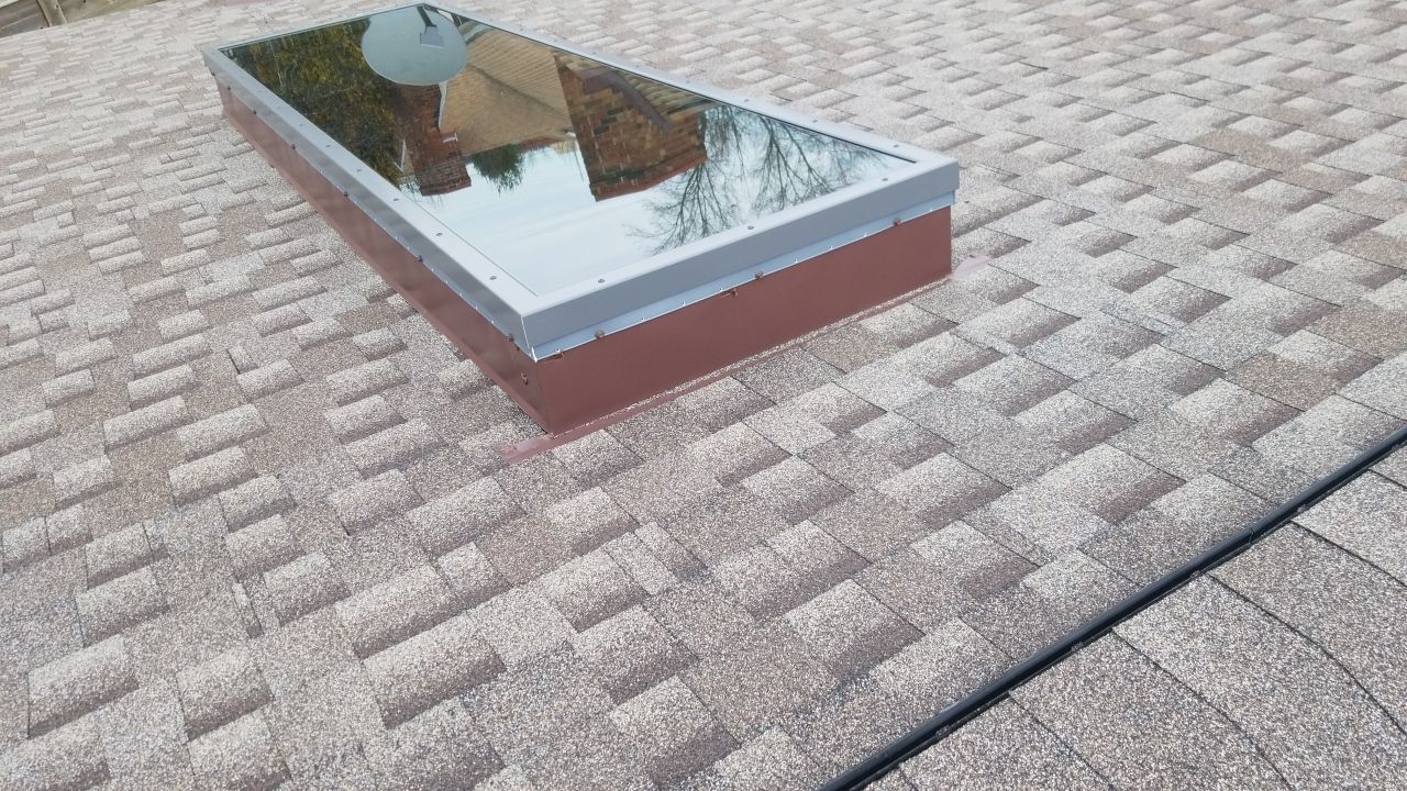 Skylight removal and install  by Absolute Roofing and Construction