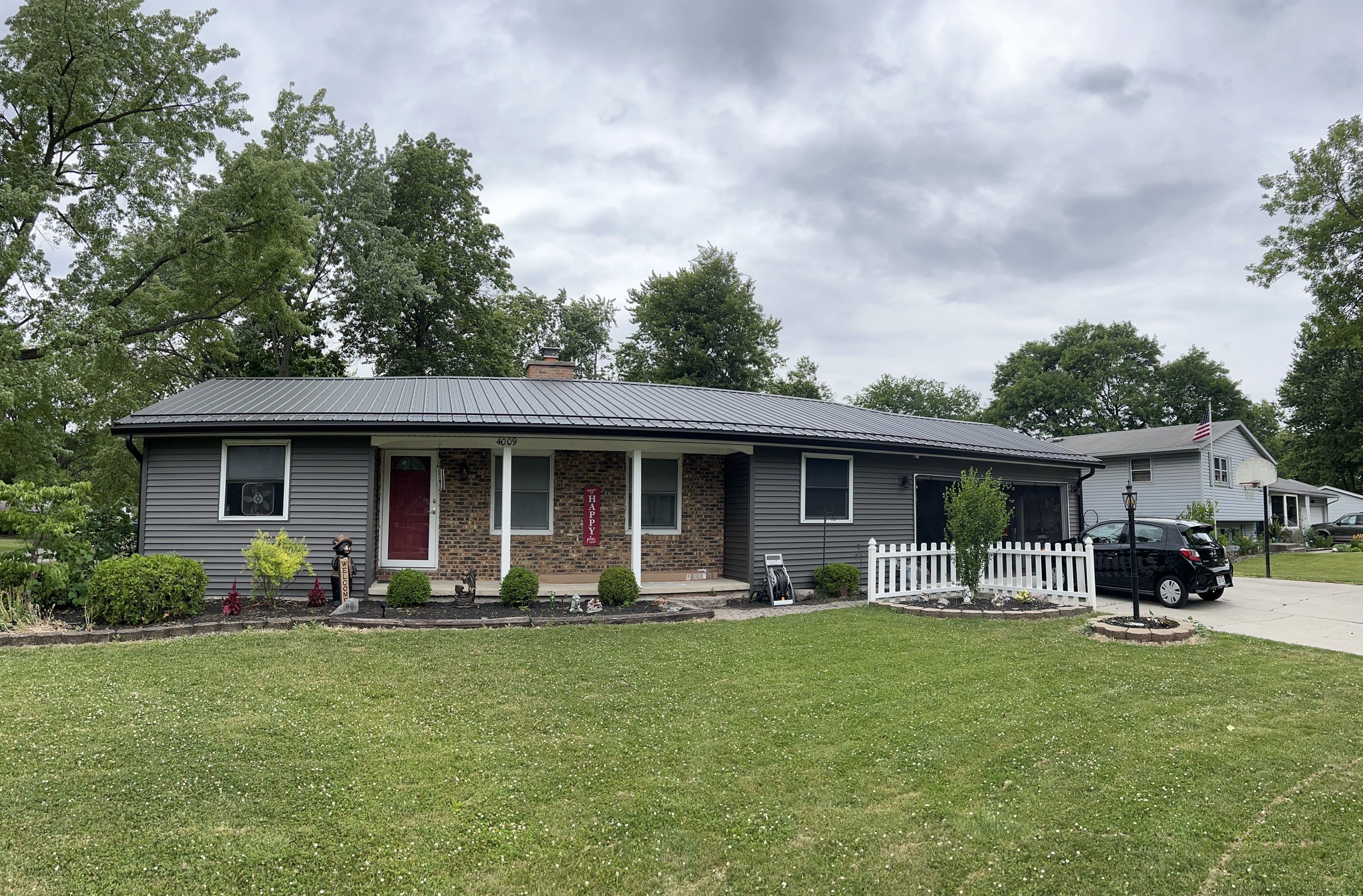 Complete Exterior Transformation - Exposed Fastener Roofing System by 4Ever Metal Roofing