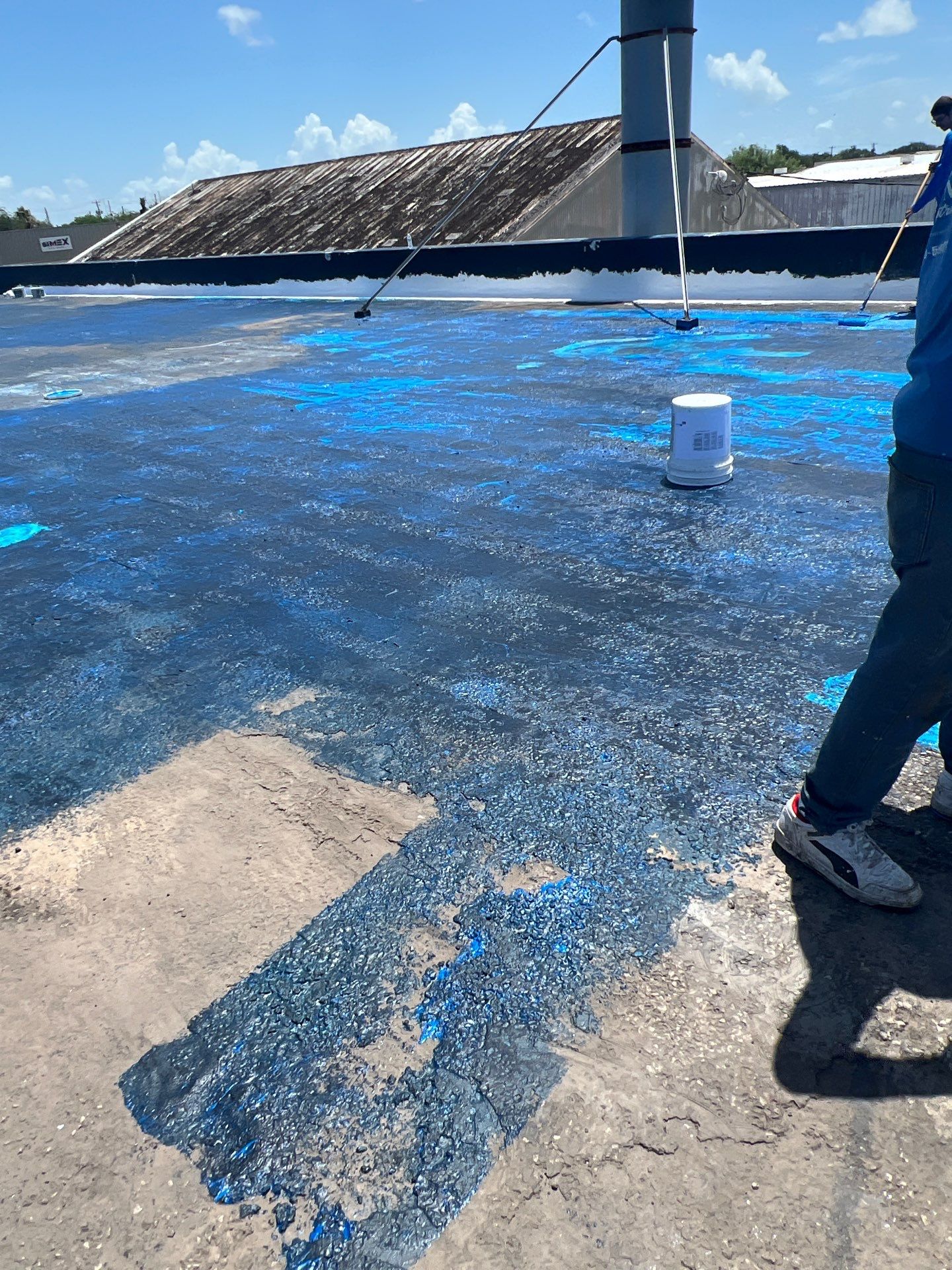 Dirty leaking Gravel Roof by Bayfront Roofing and Construction