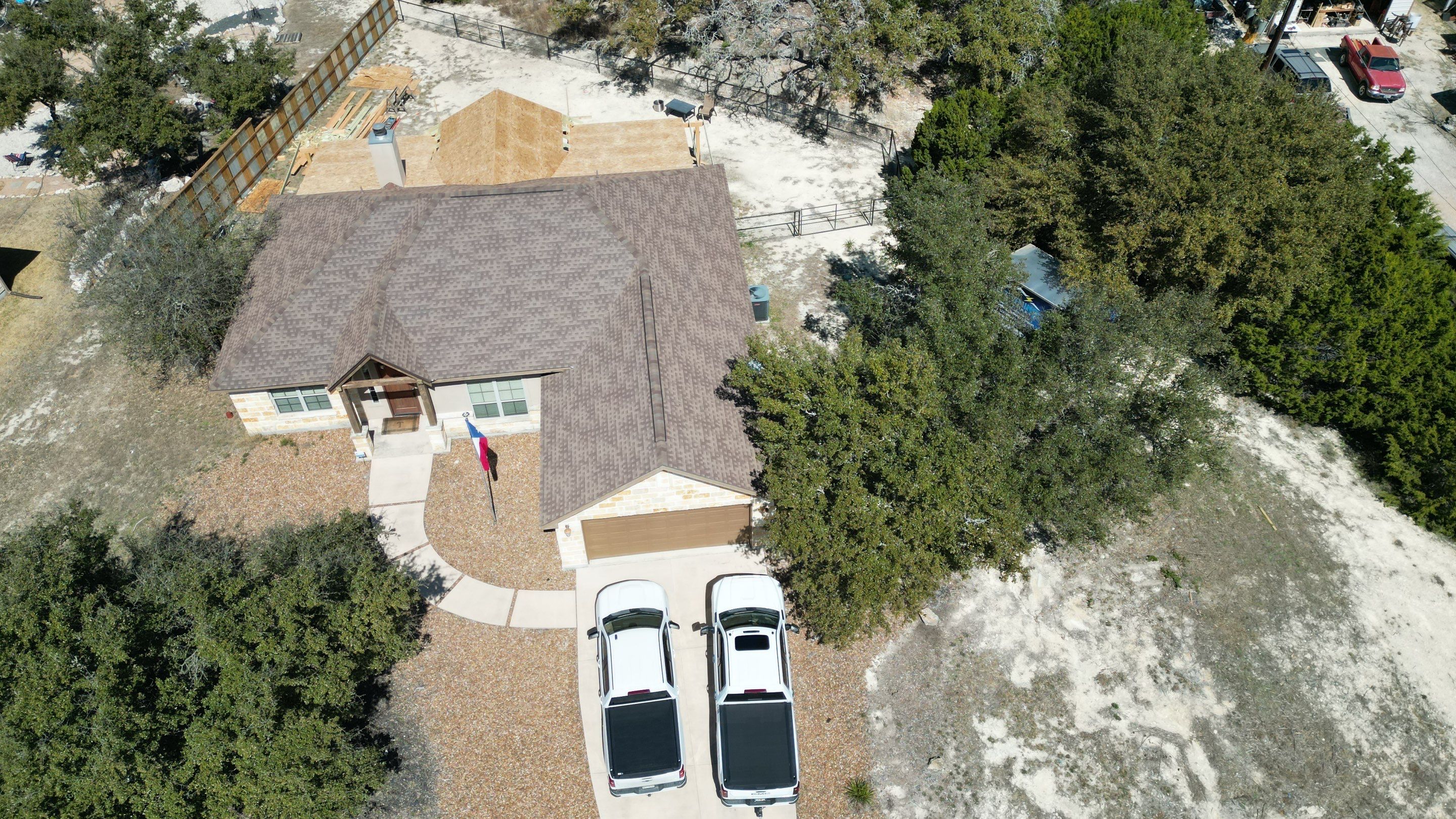 Reroof with Back Patio Addition using Owens Corning Duration Aged Copper by Lightning Exteriors